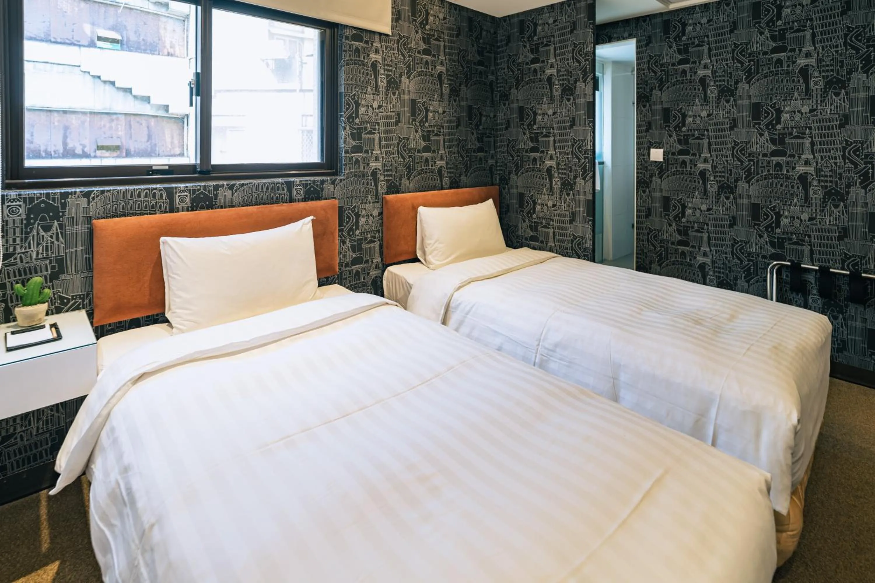 Bed in Hotel Puri Taipei Station Branch