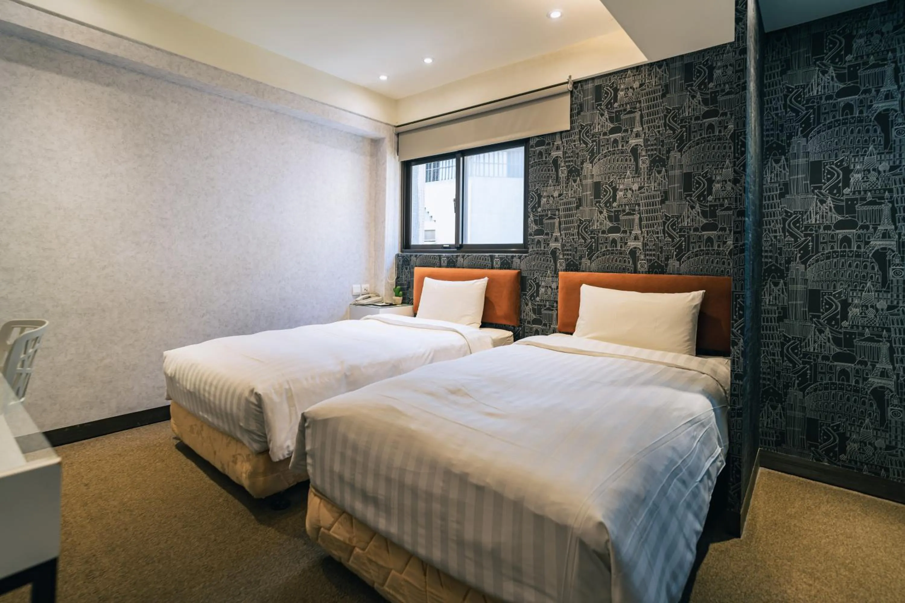 Bed in Hotel Puri Taipei Station Branch