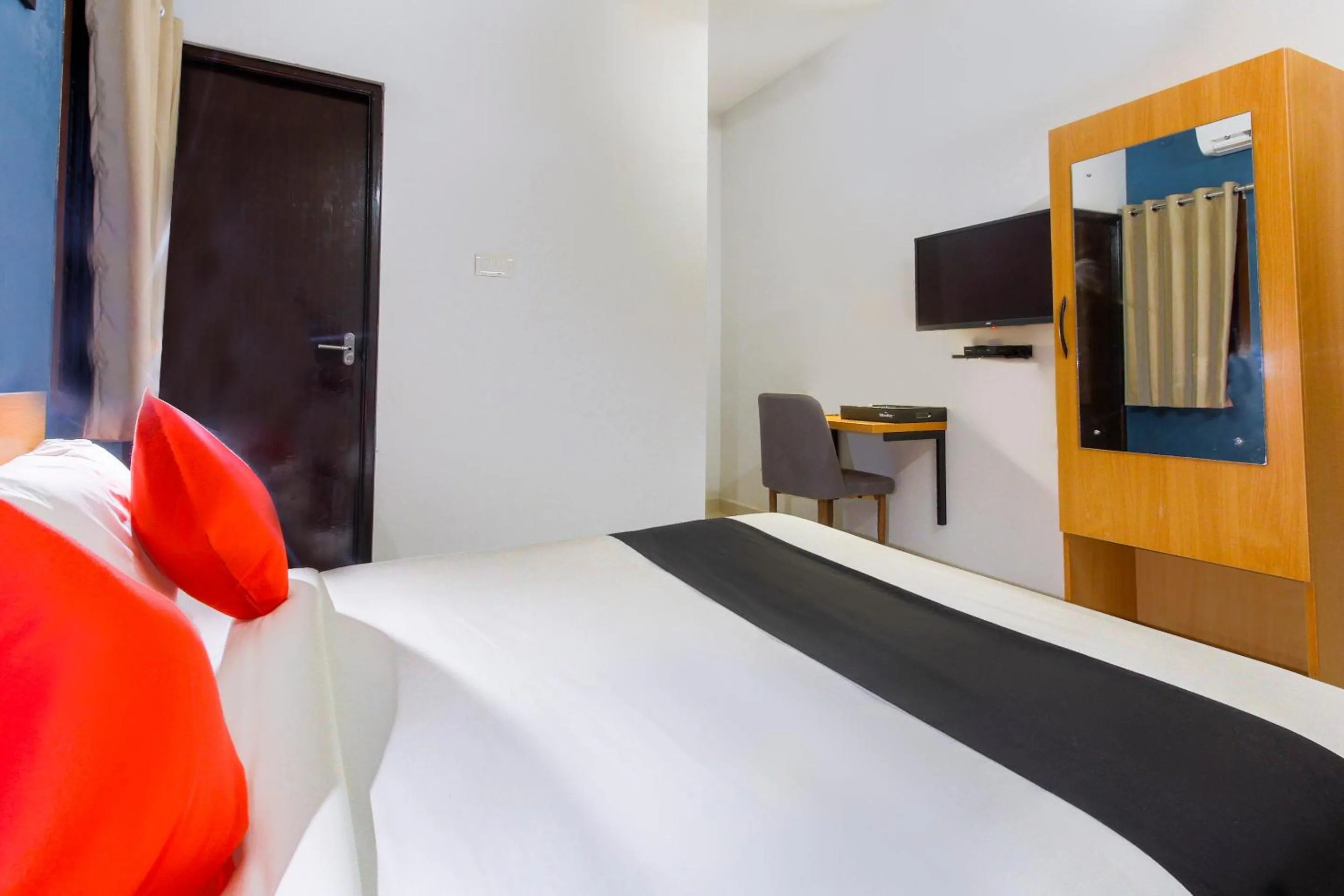 Bedroom in Hotel O Murugan Rooms