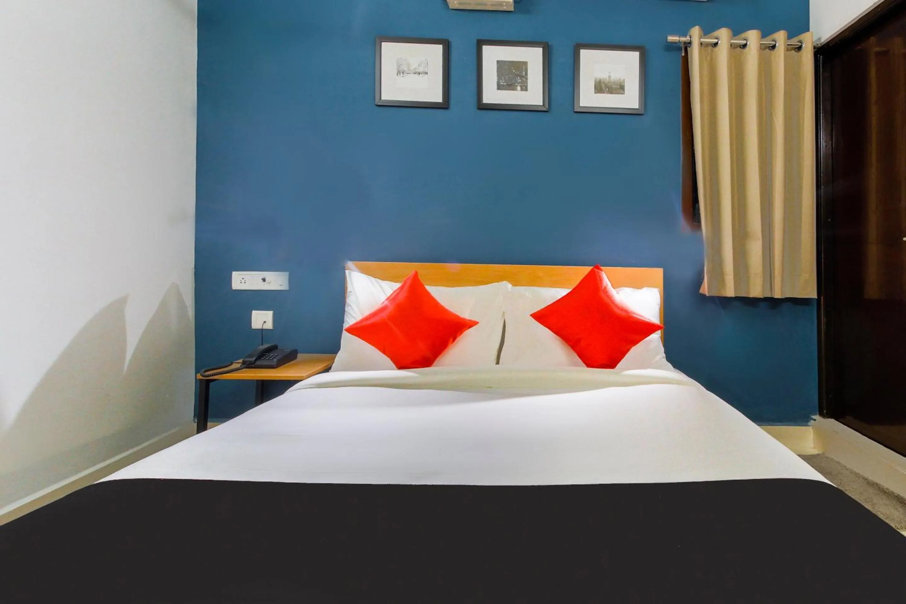 Bedroom in Hotel O Murugan Rooms
