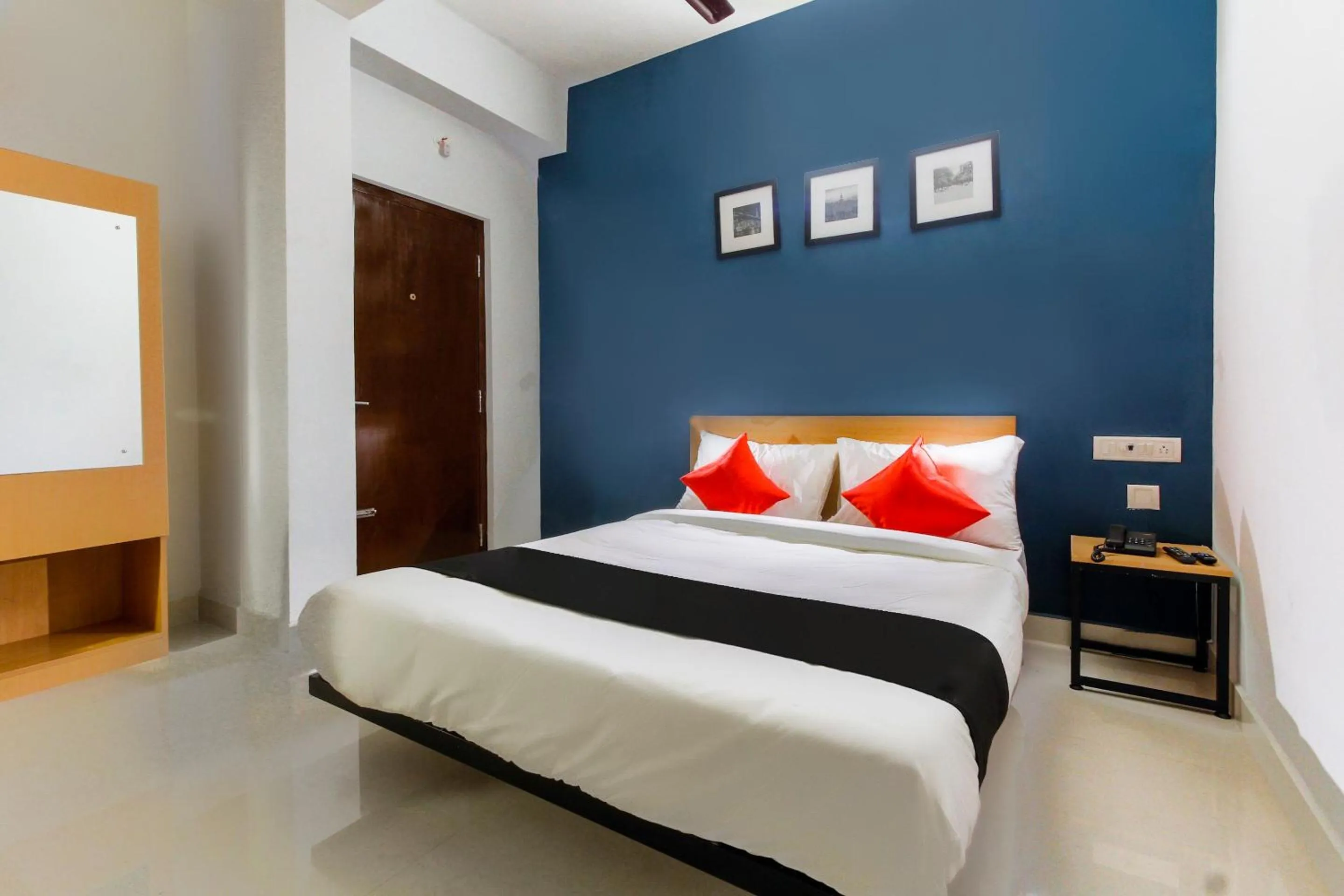 Bedroom in Hotel O Murugan Rooms