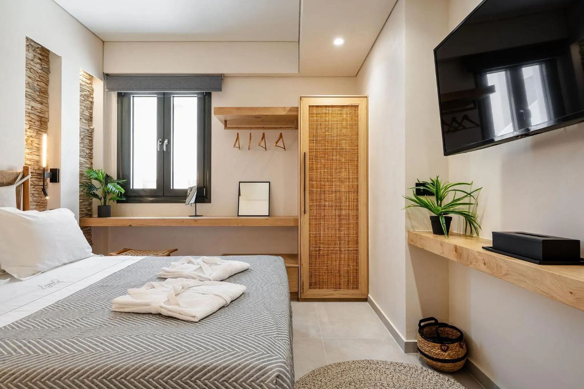 Bed in Legato Spa Suites