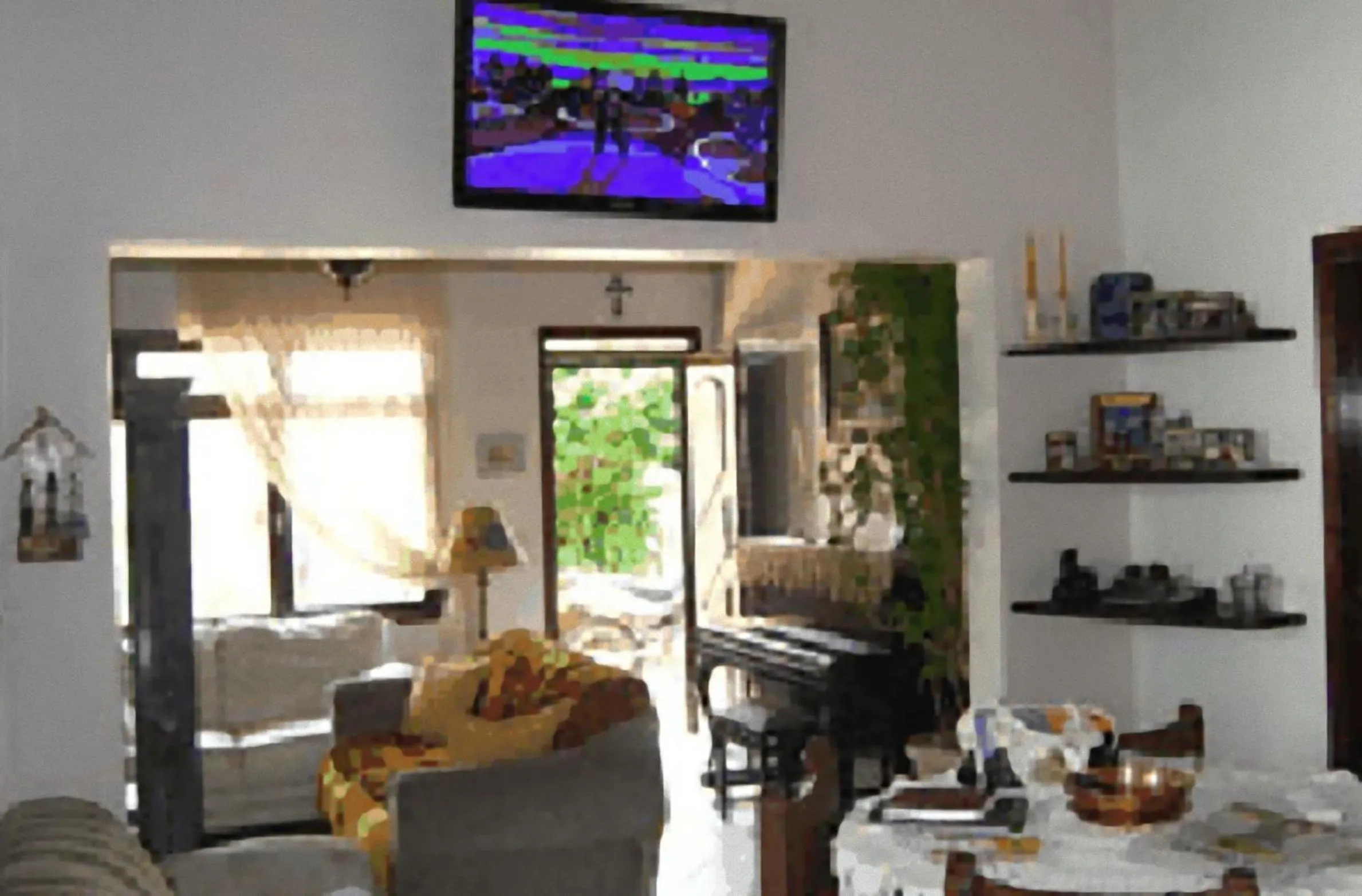 Communal lounge/ TV room in Hotel Pousada do Comendador