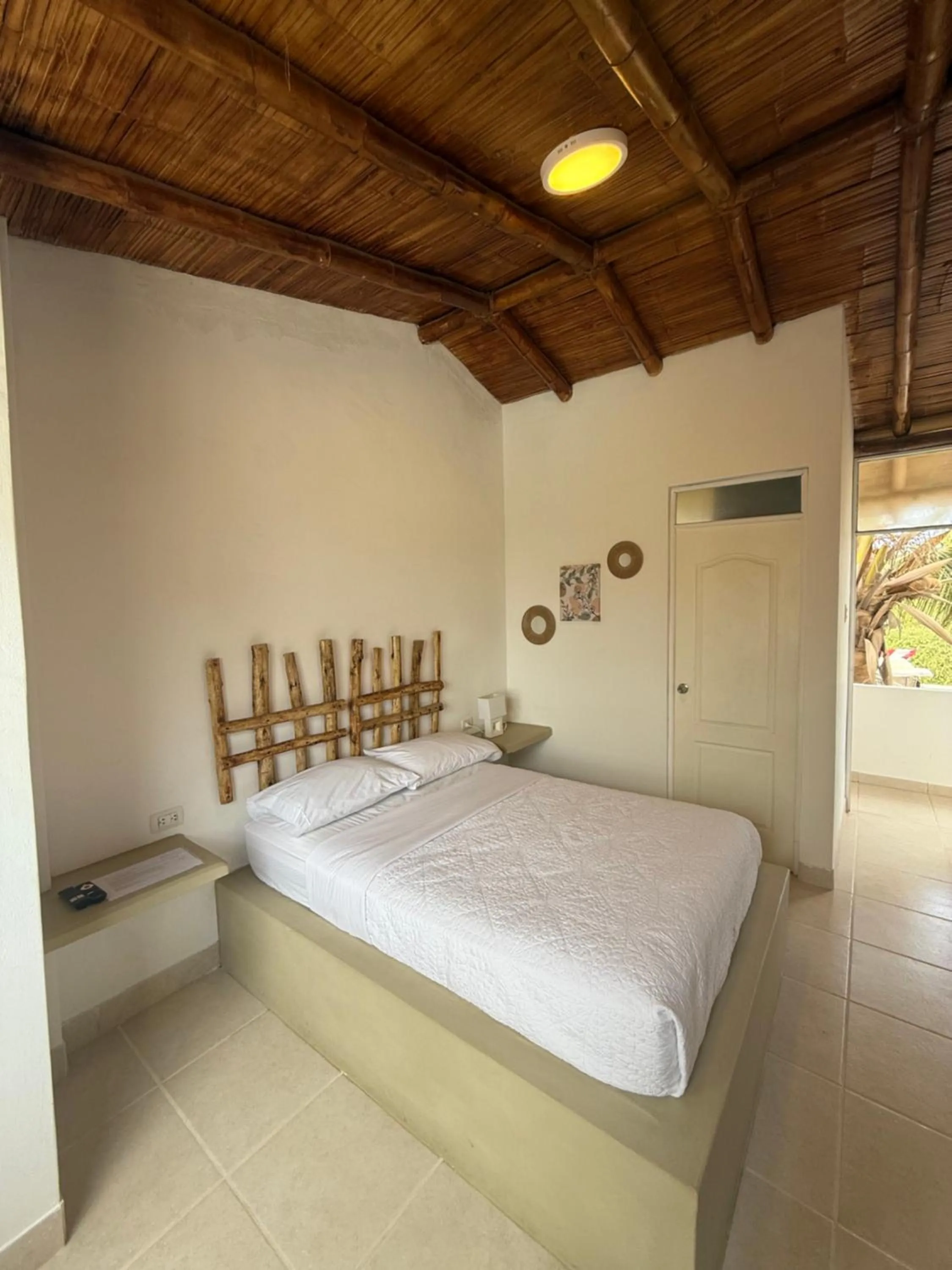 Bed in Hotel Puerto Antiguo