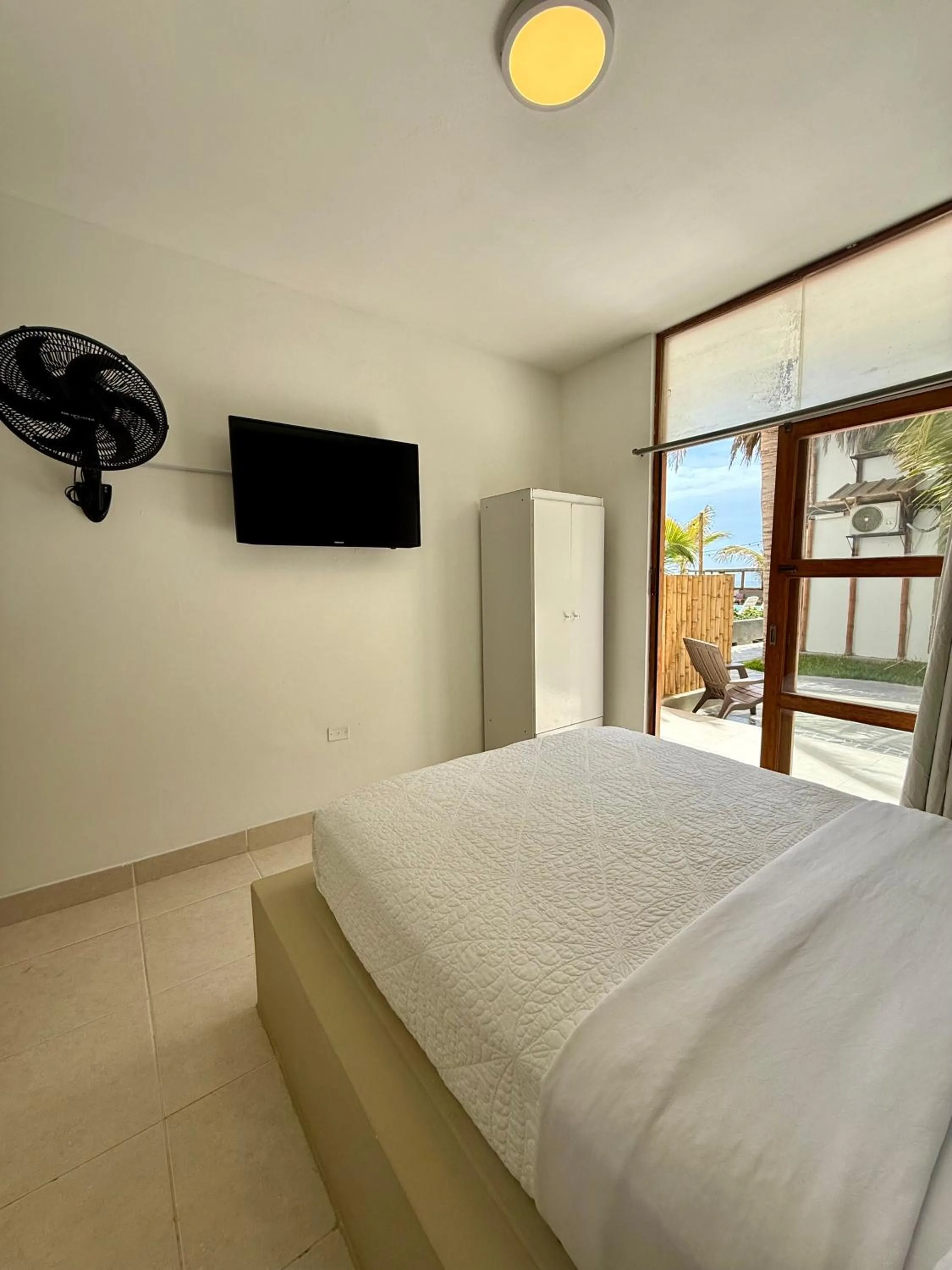 Bed in Hotel Puerto Antiguo