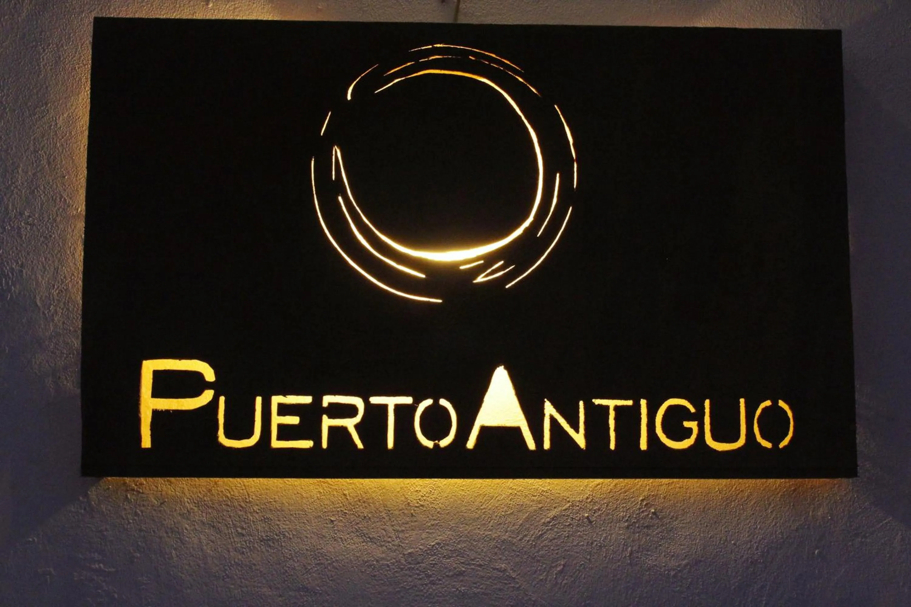 Property logo or sign in Hotel Puerto Antiguo