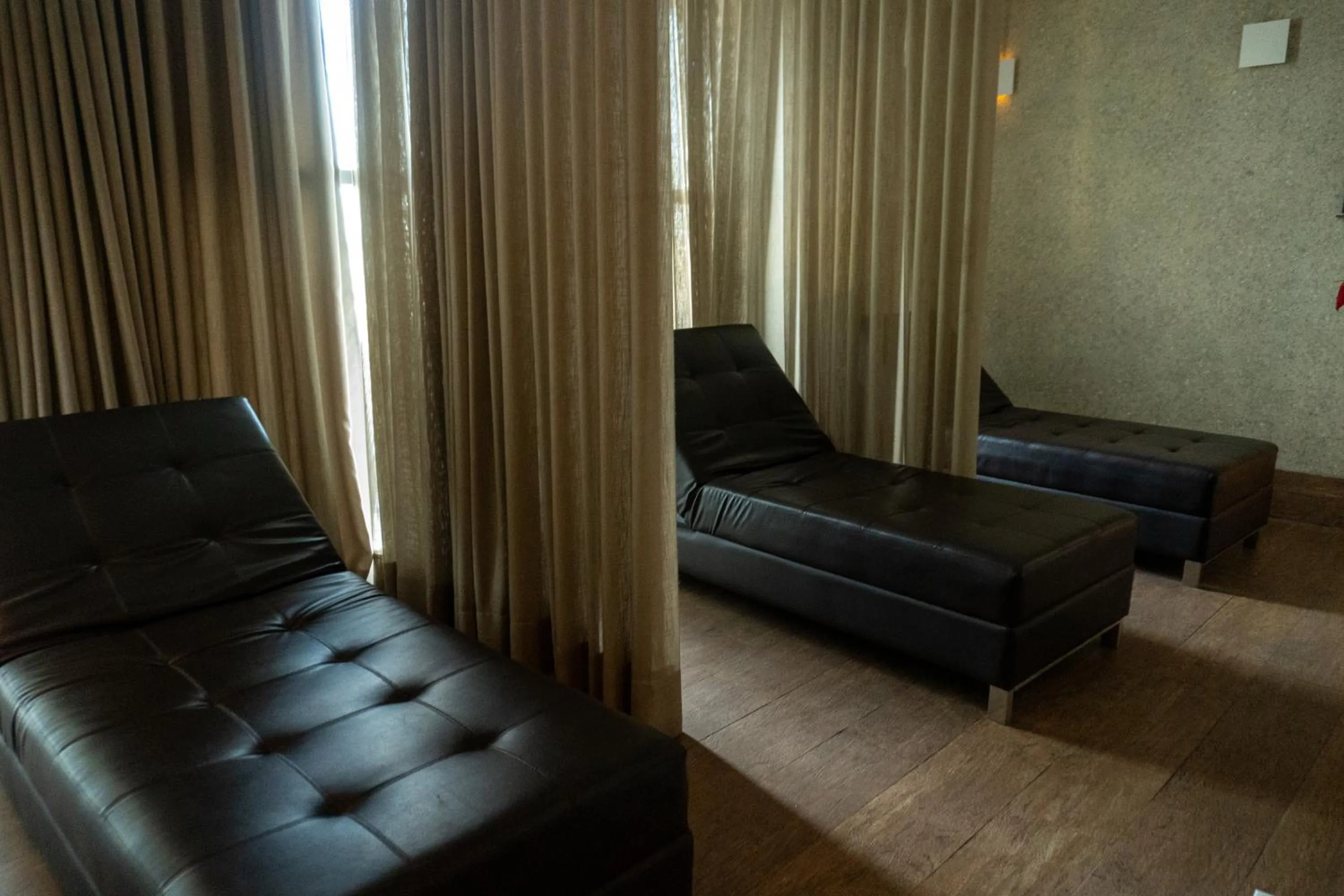 Seating area in San Diego Suites Veredas Sete Lagoas