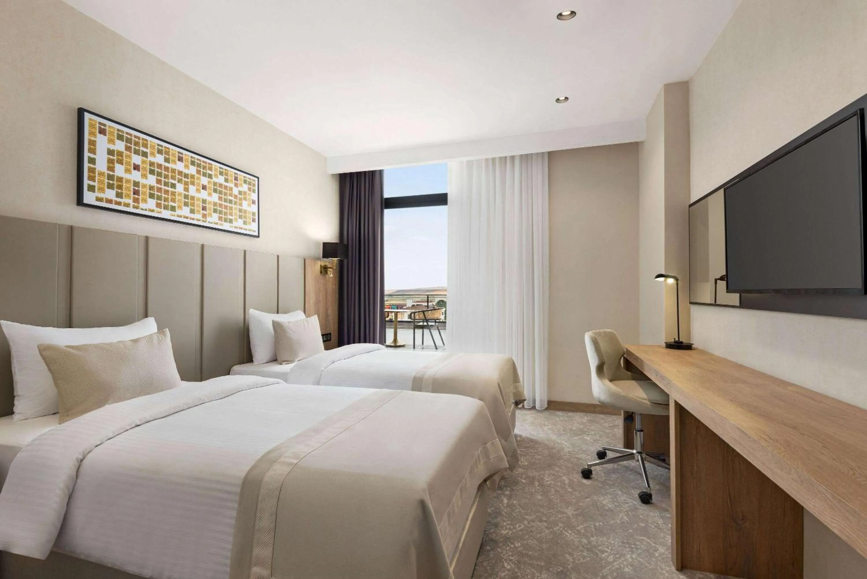 Photo of the whole room, Bed in Ramada Plaza By Wyndham Batman