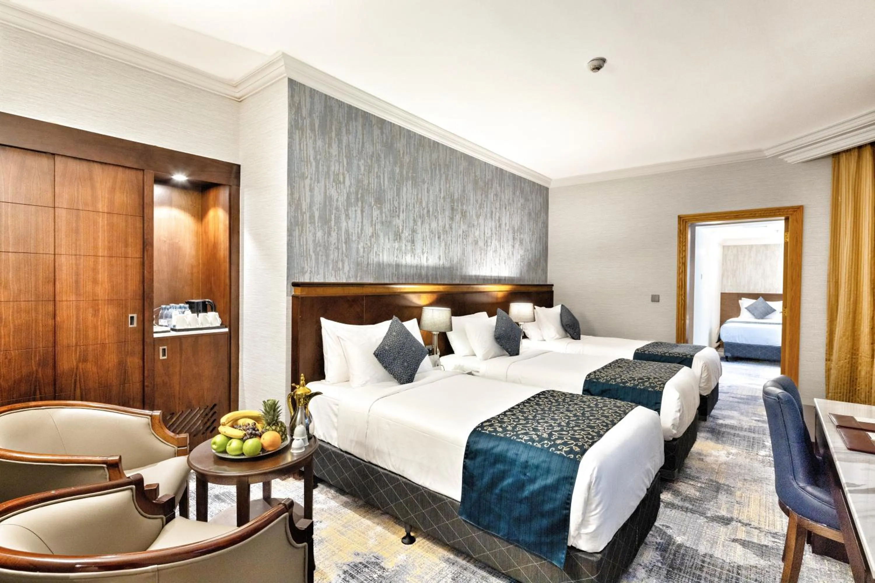 Bed in Nozol Royal Inn Hotel