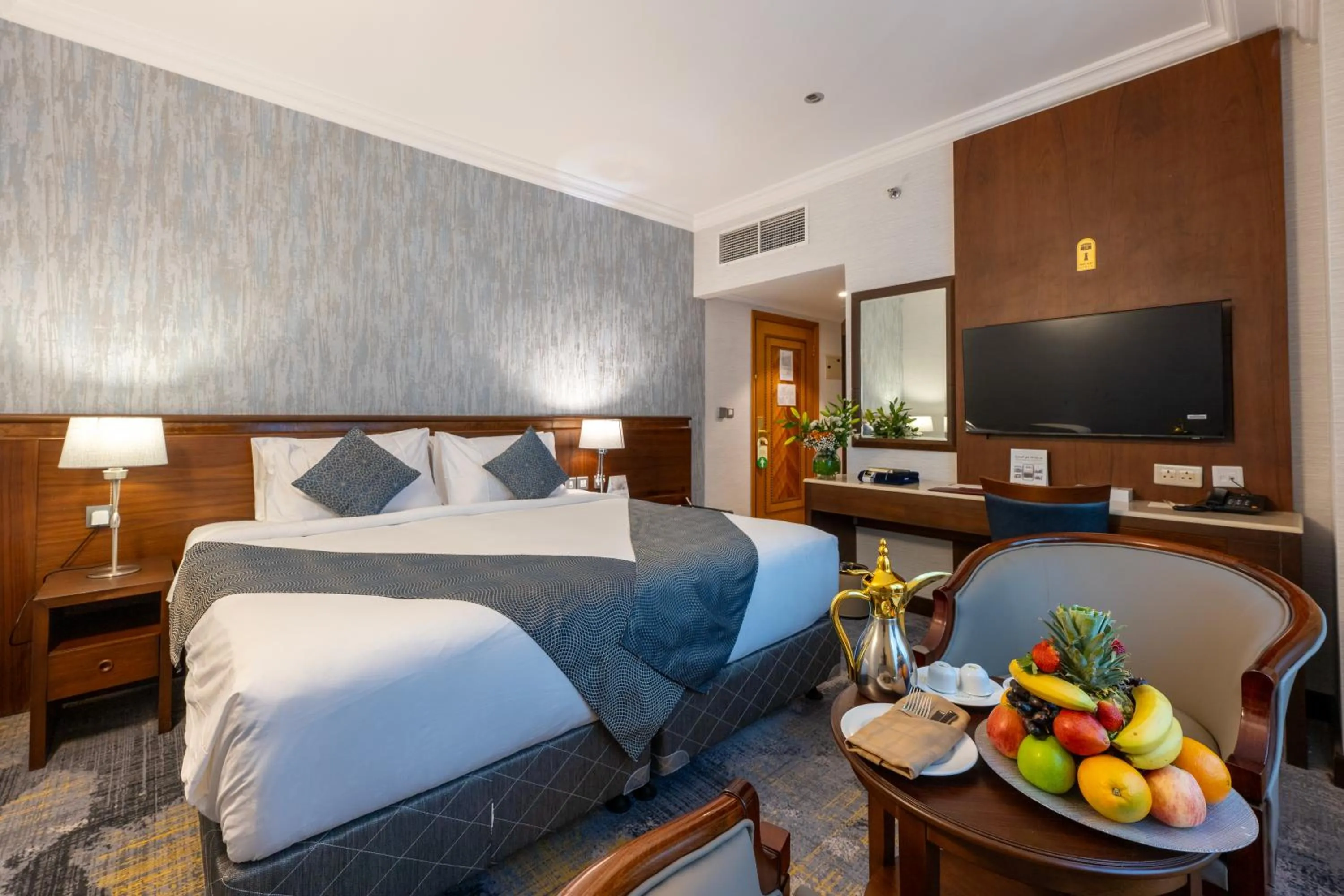 Bed in Nozol Royal Inn Hotel