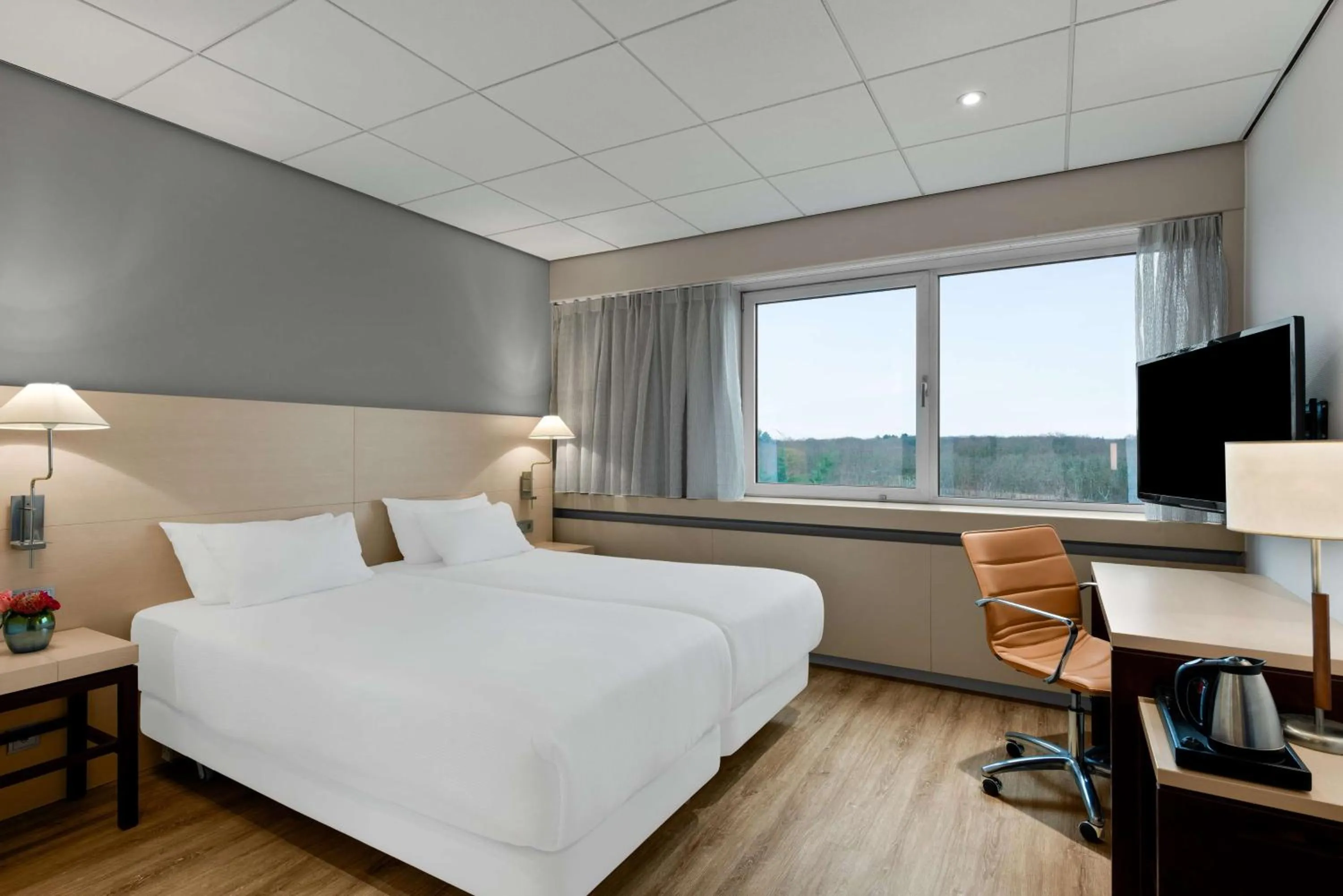 Bedroom, Bed in NH Noordwijk Conference Centre Leeuwenhorst