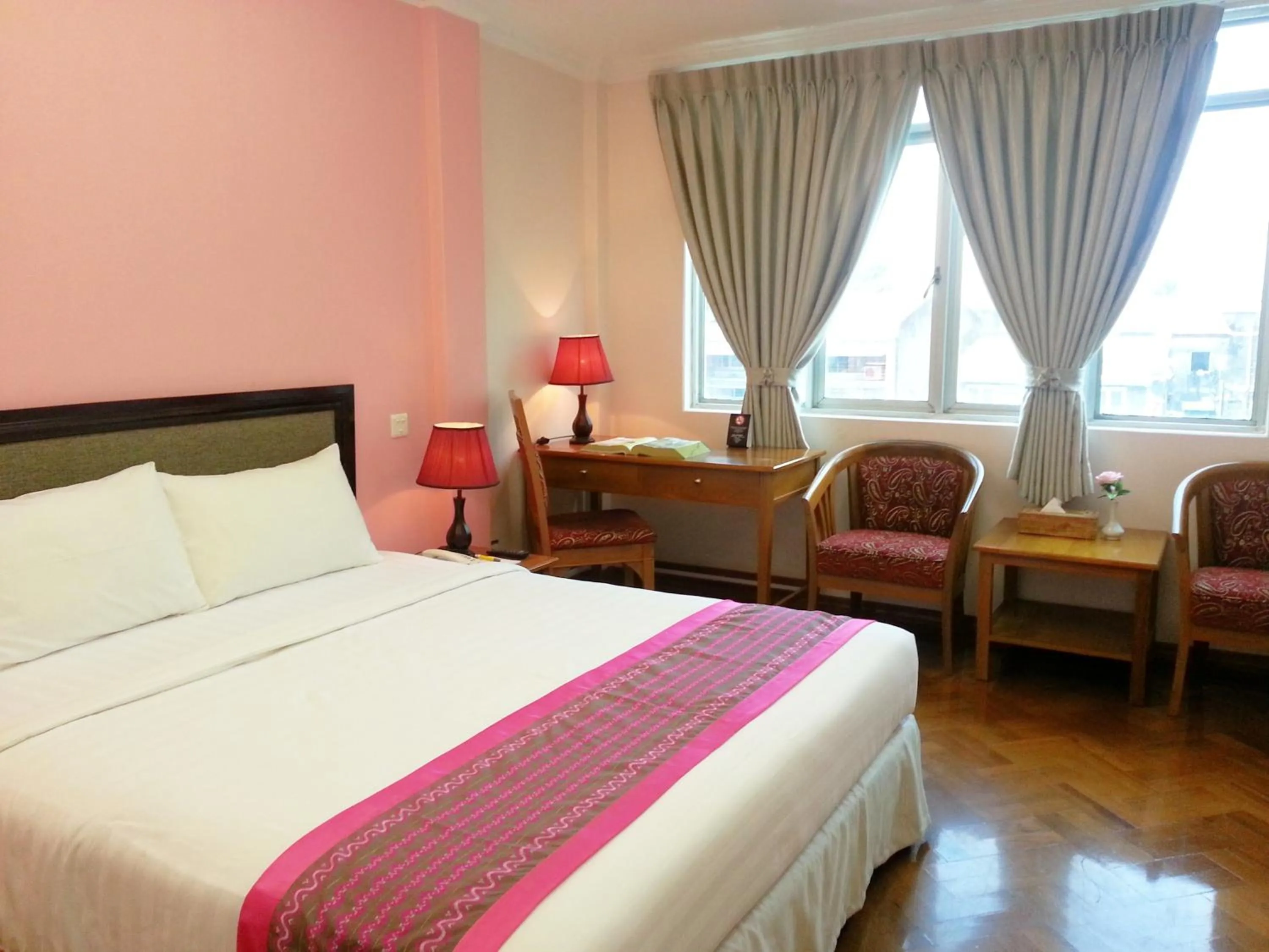 Photo of the whole room, Bed in Grand Laurel Hotel