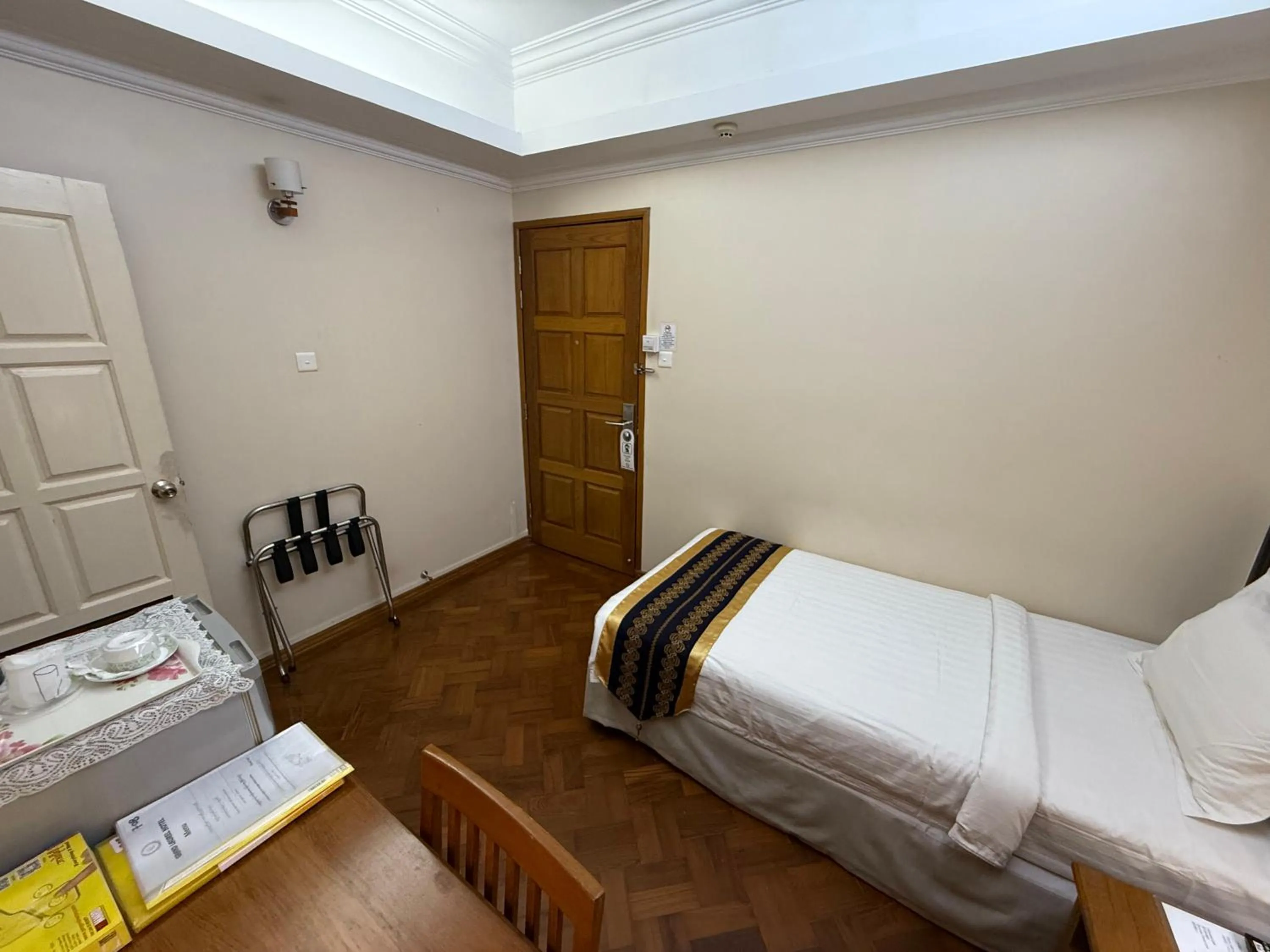 Bed in Grand Laurel Hotel