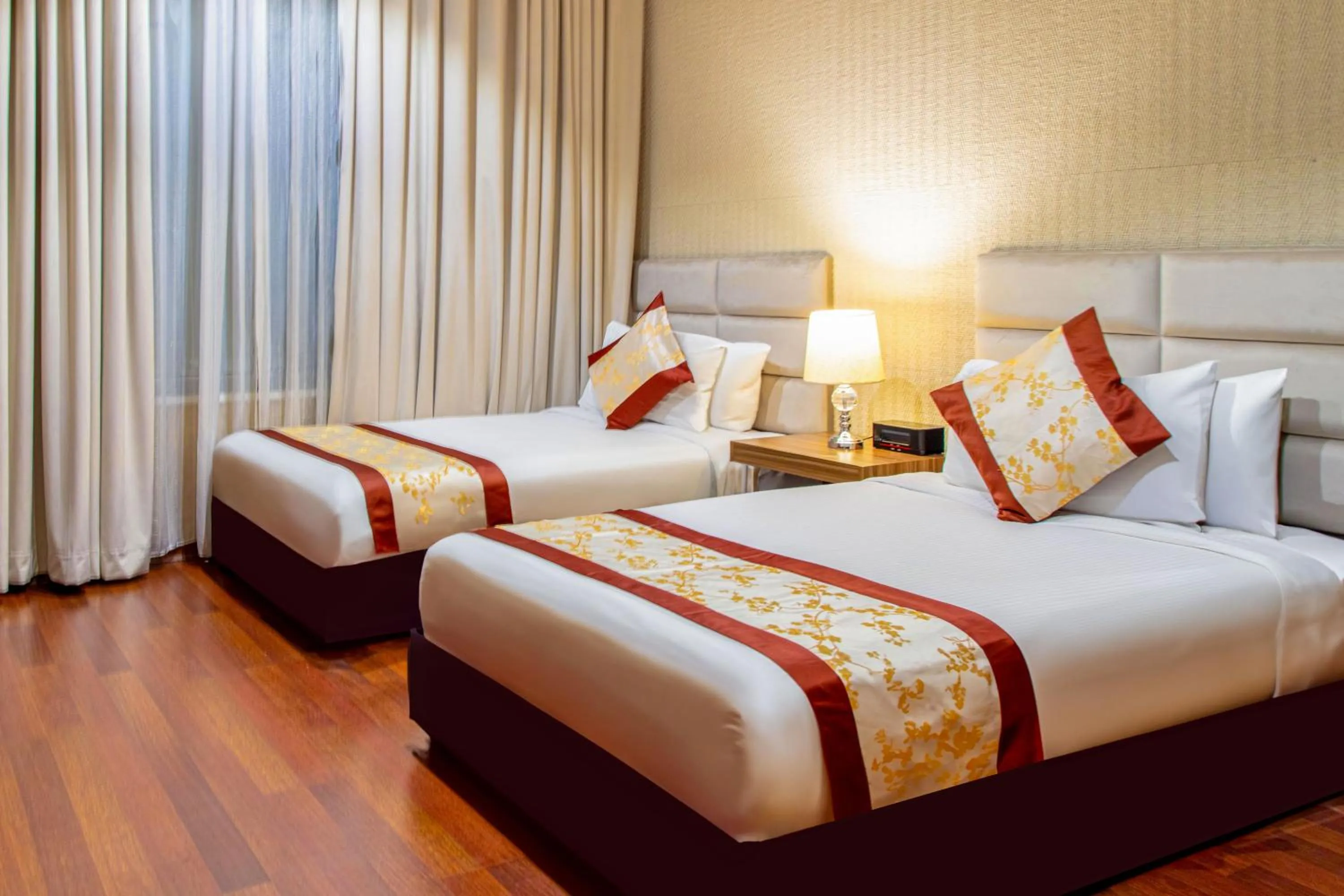 Bed in City Tower Hotel