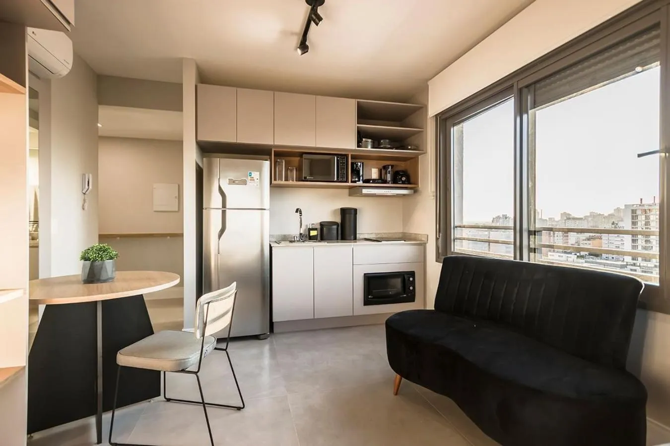 Living room in Lindo studio novo e moderno JRE1401