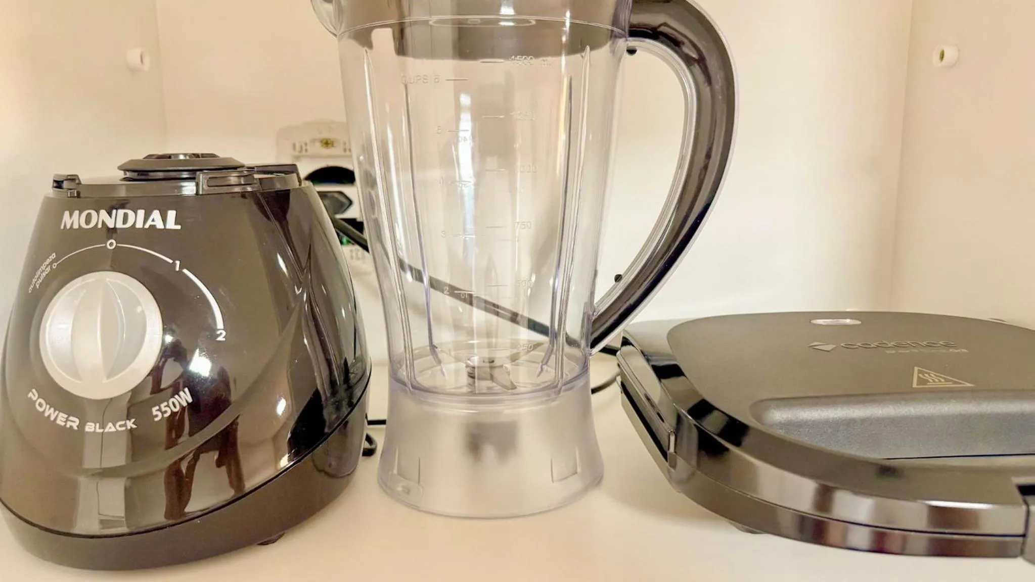 Kitchen or kitchenette in APTOS 1 e 2QTO Lava e Seca e Academia