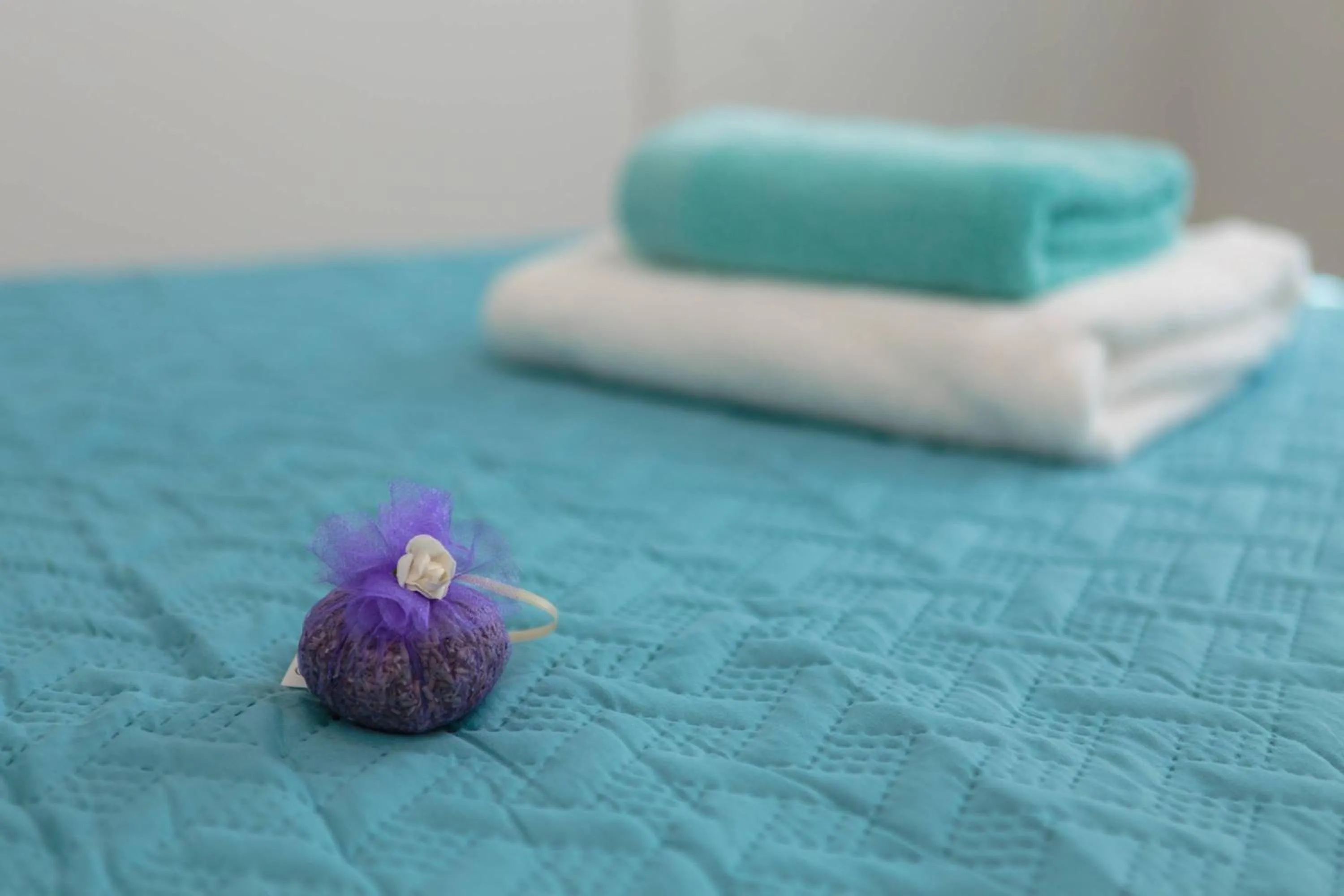 Bed in PLR Luxury Rooms