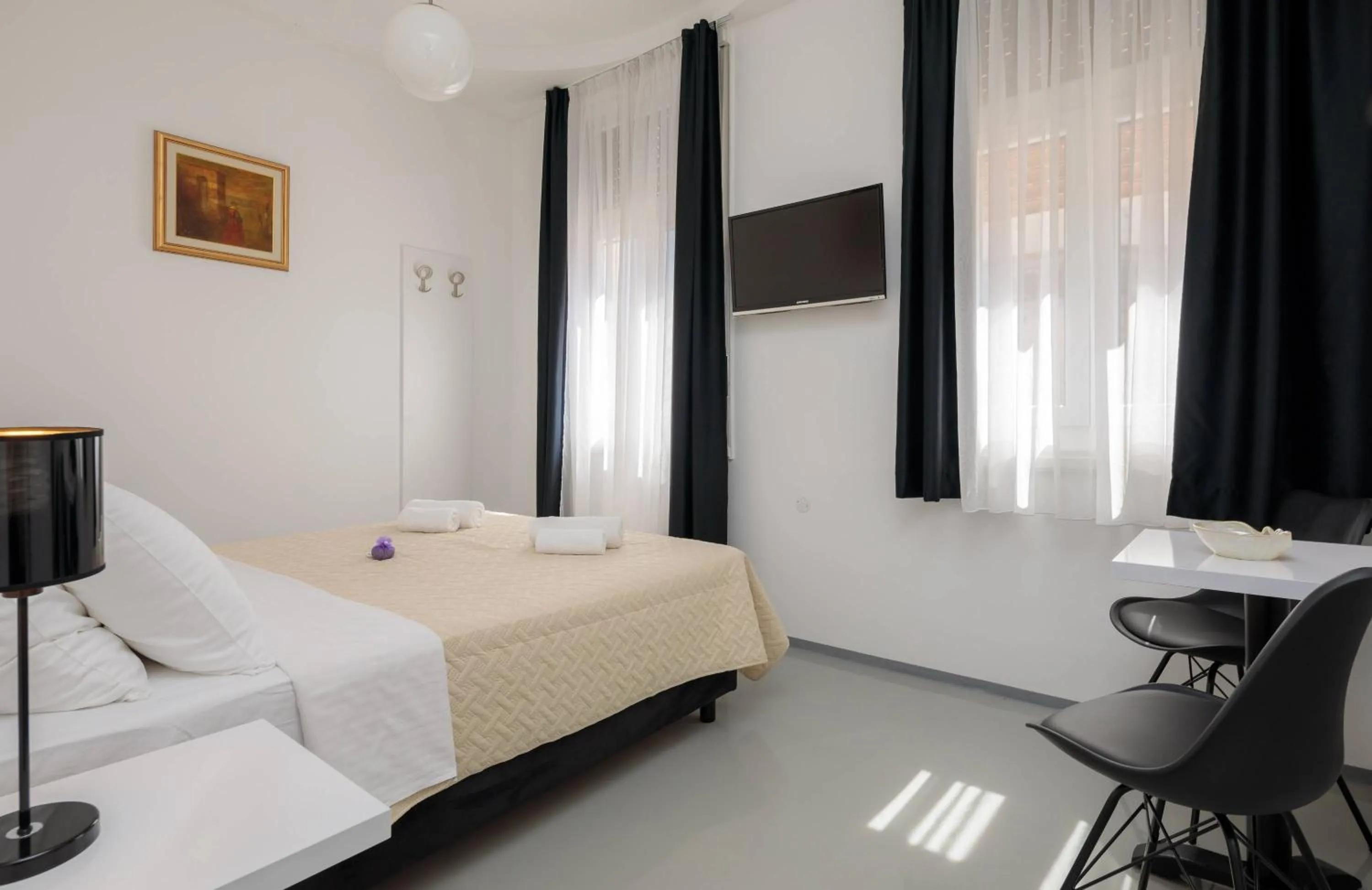 Bed in PLR Luxury Rooms