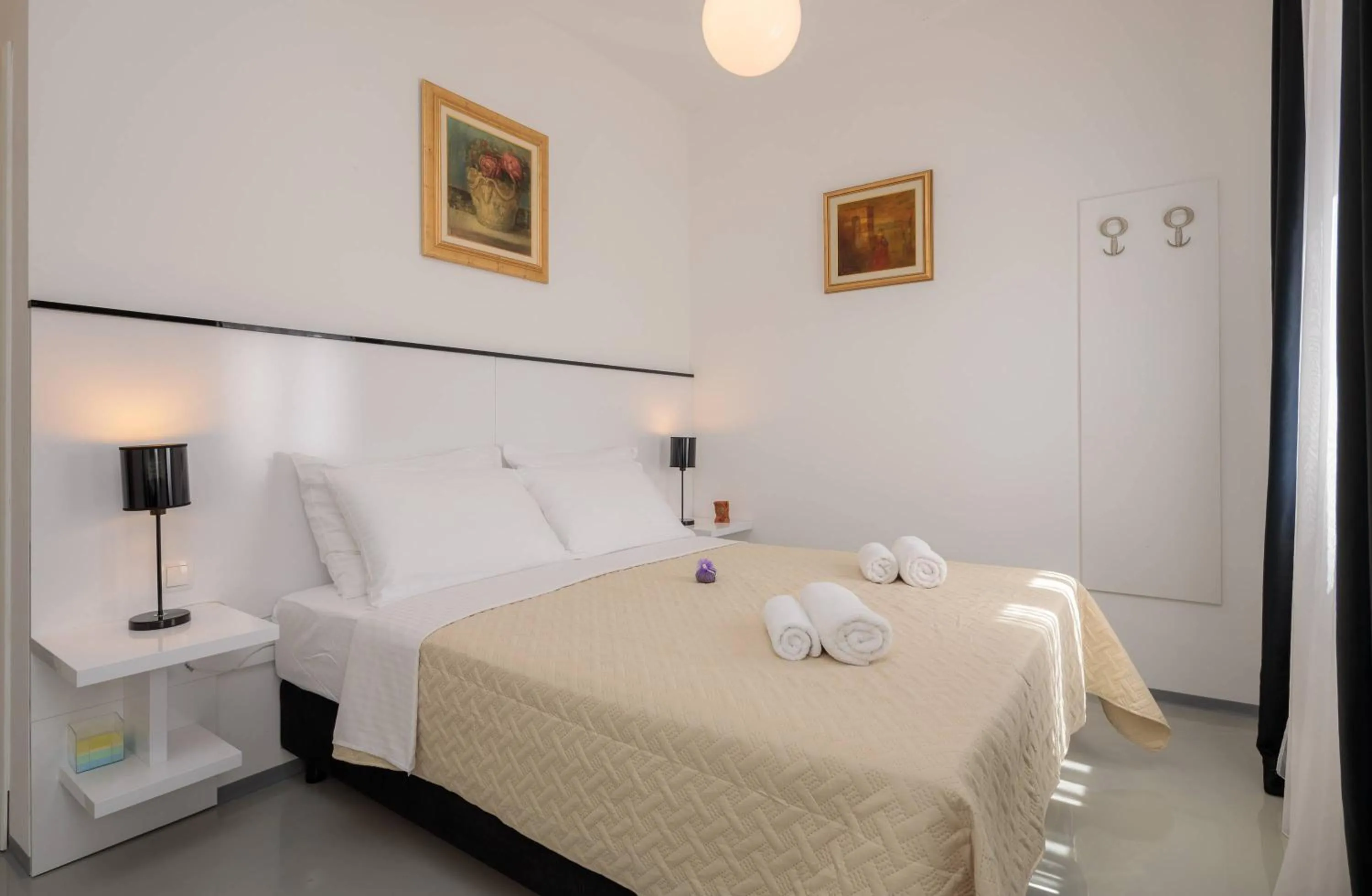 Bed in PLR Luxury Rooms