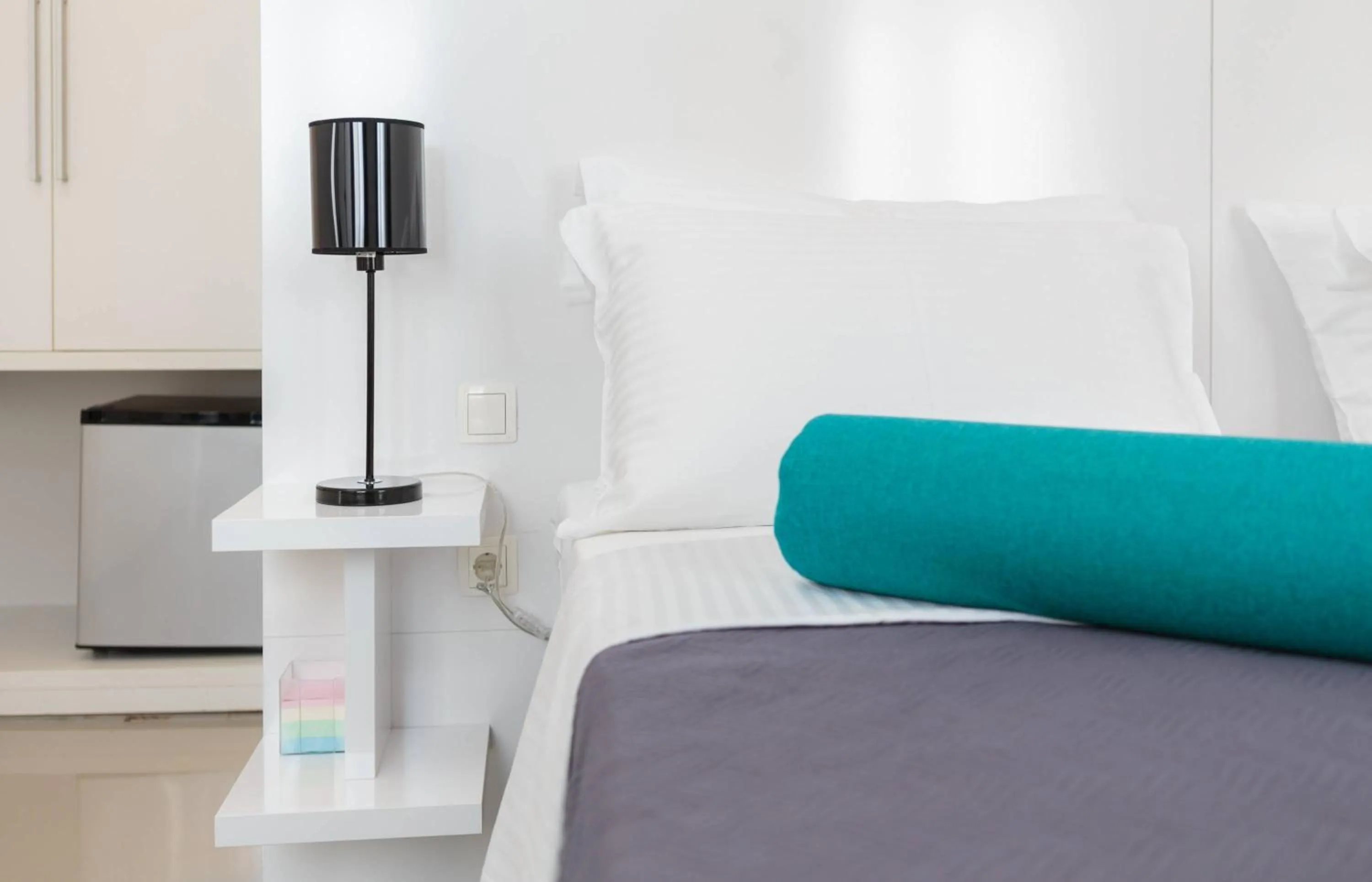 Bed in PLR Luxury Rooms