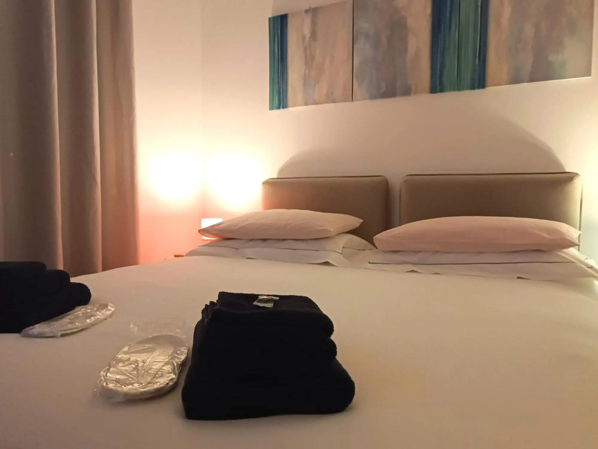 Bed in Rose Antiche Vatican B&B