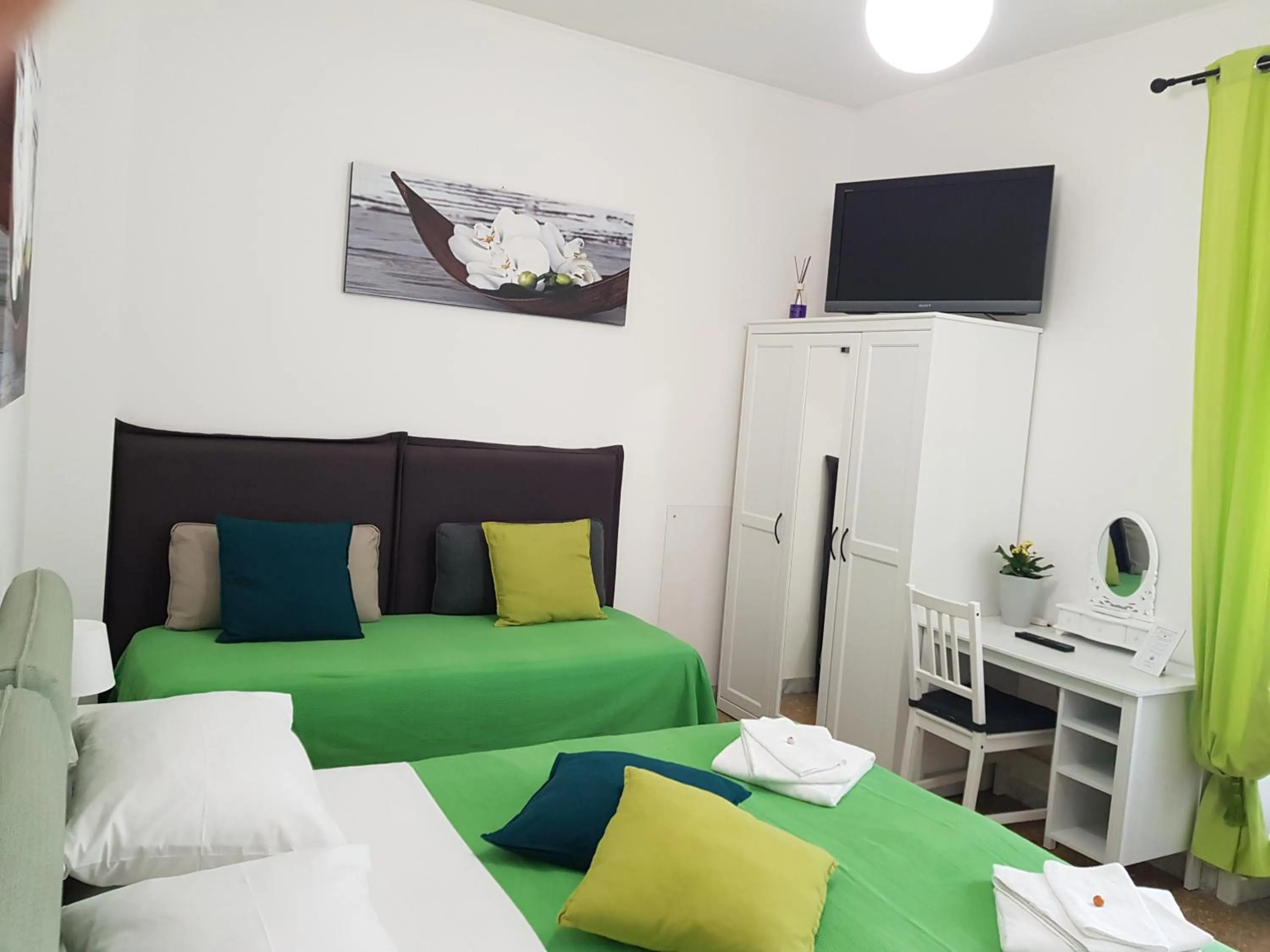 Bed in Rose Antiche Vatican B&B