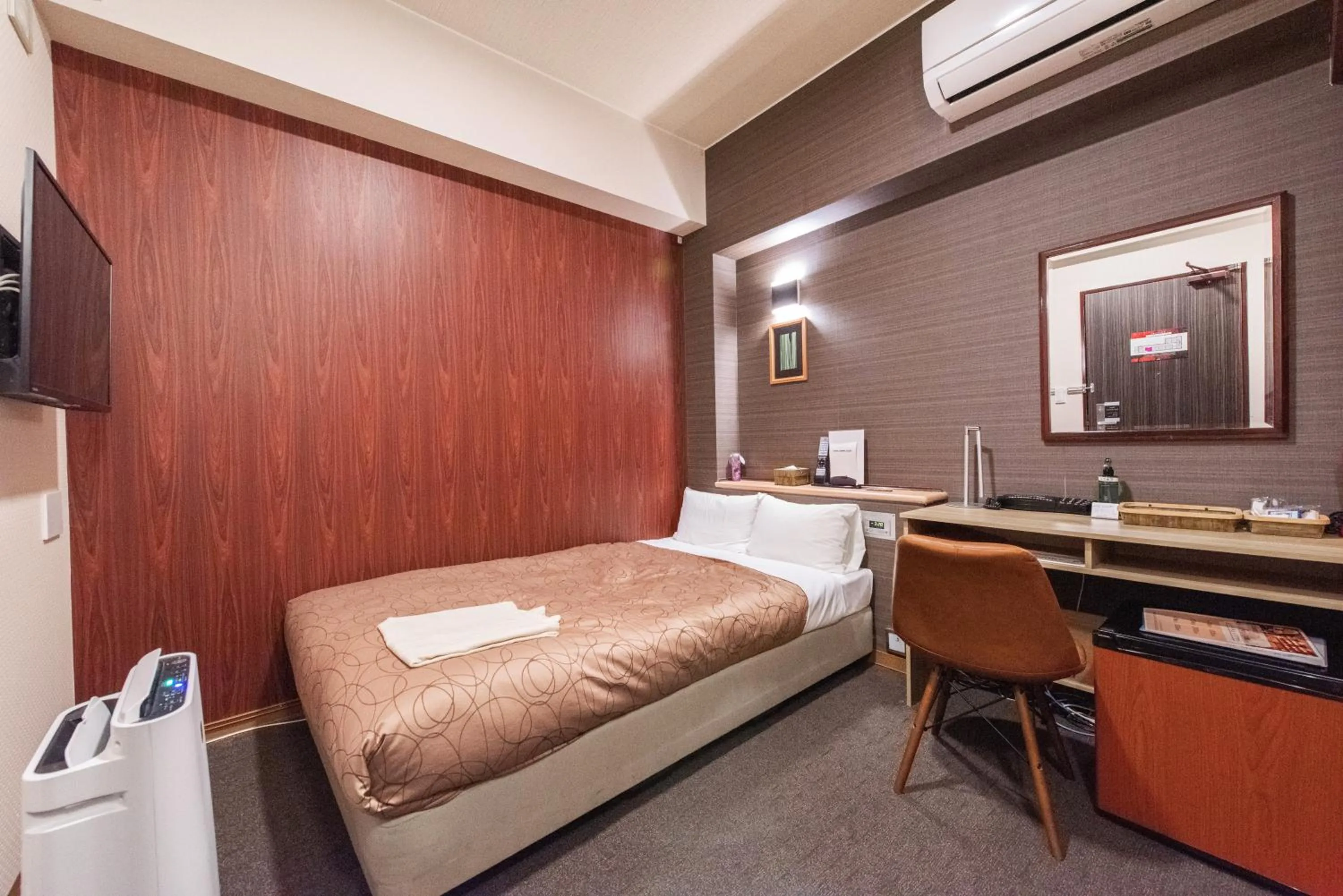 Bed in HOTEL RELIEF Kokura Station