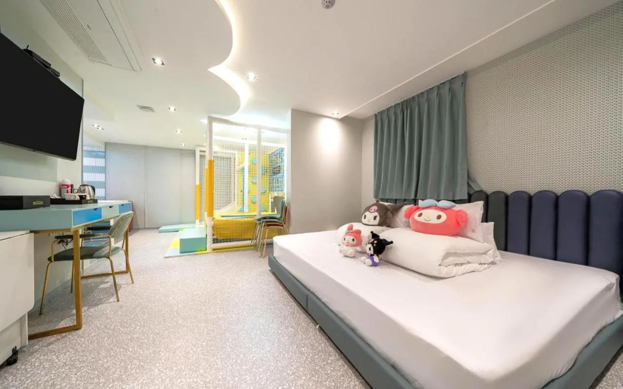 Bed in Jangyu Almond Kids Hotel