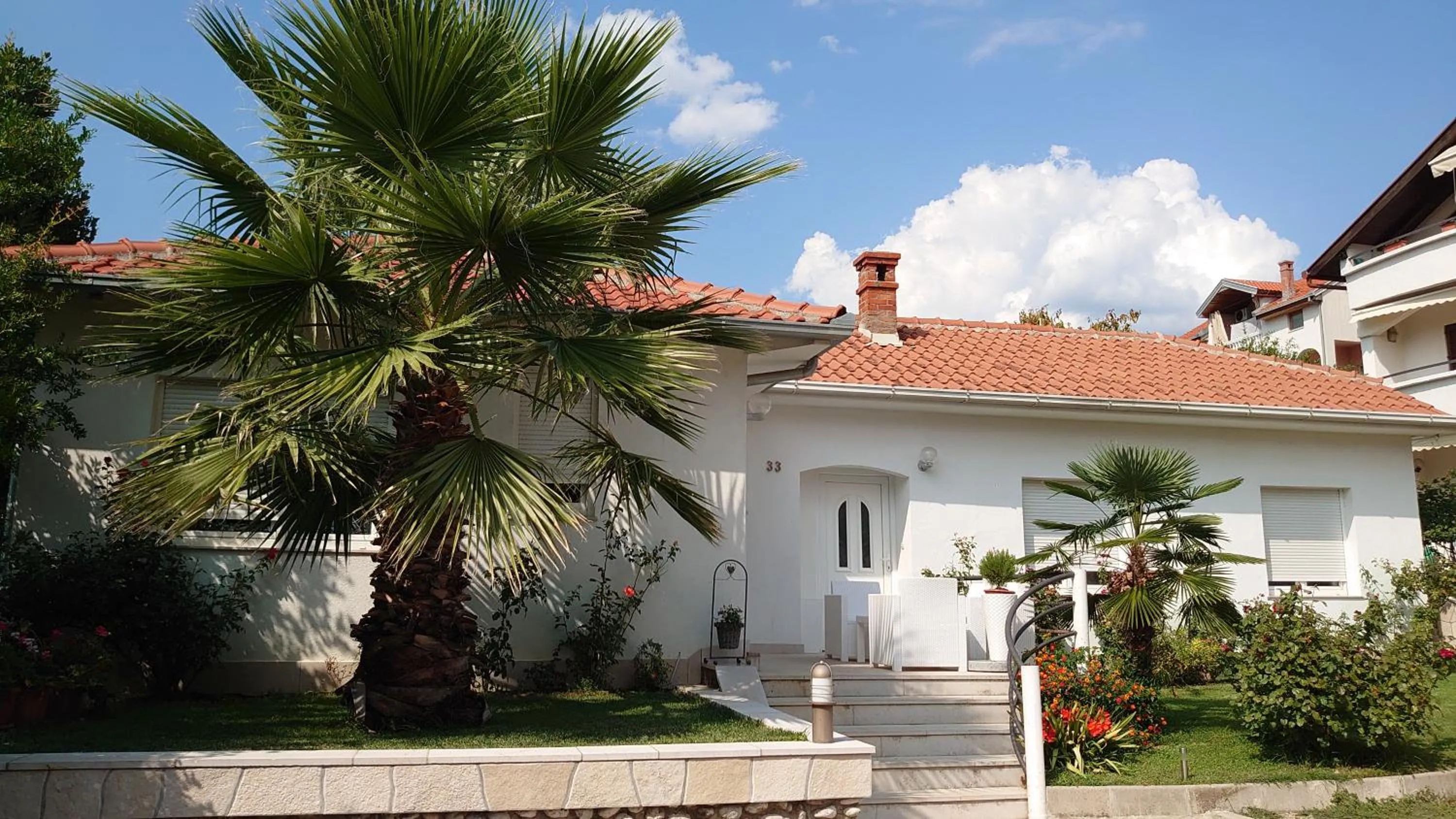 Property building in Apartments Tulipan - with free private parking garage