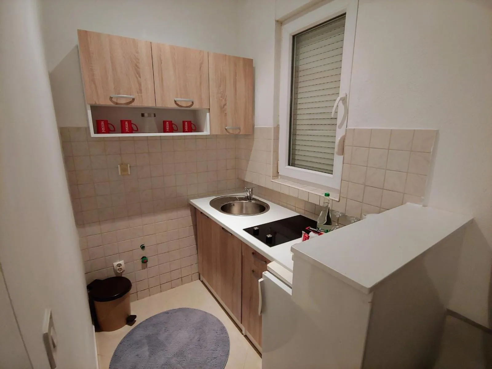 Kitchen or kitchenette in Apartments Tulipan - with free private parking garage
