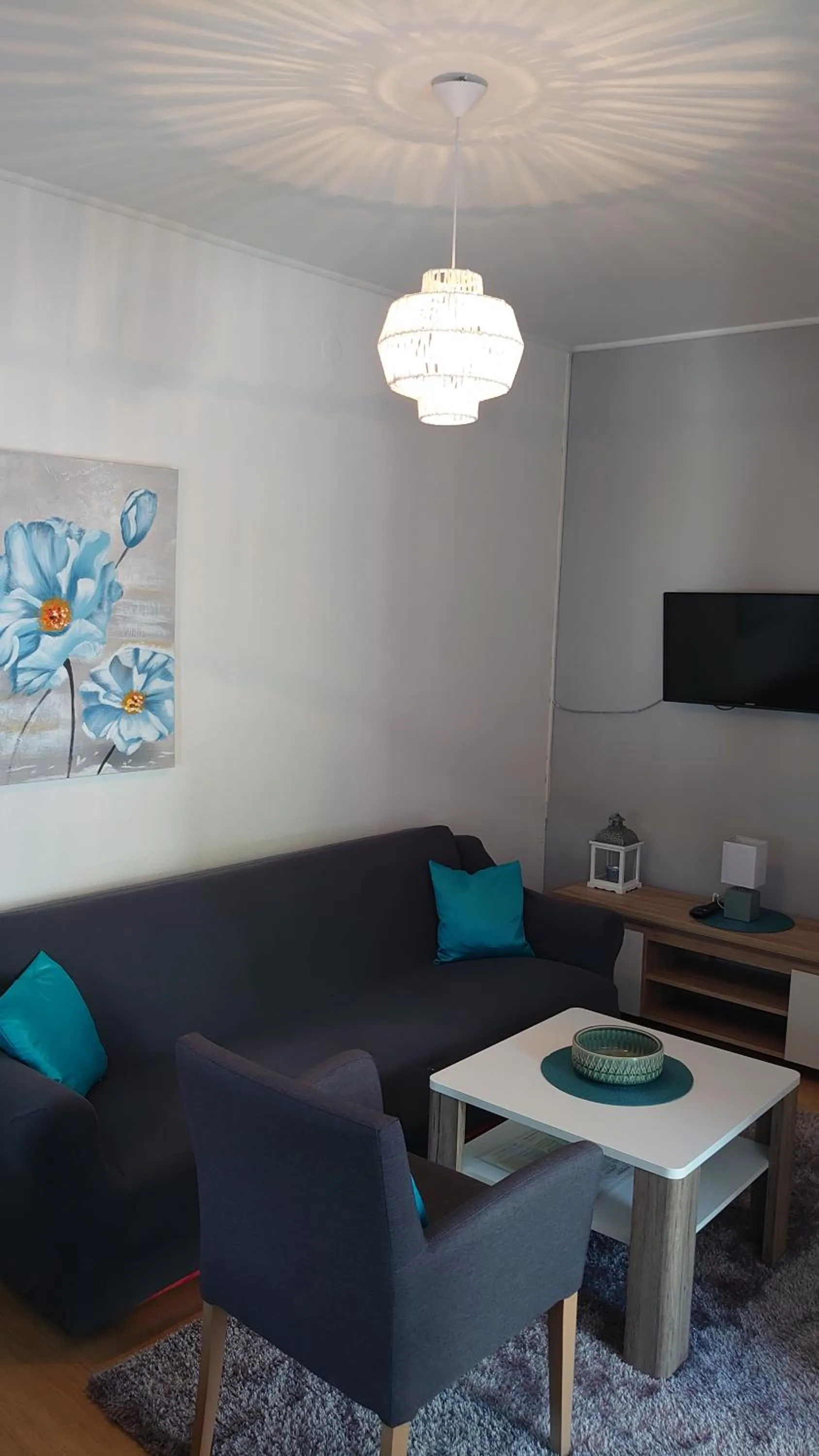 Living room in Apartments Tulipan - with free private parking garage