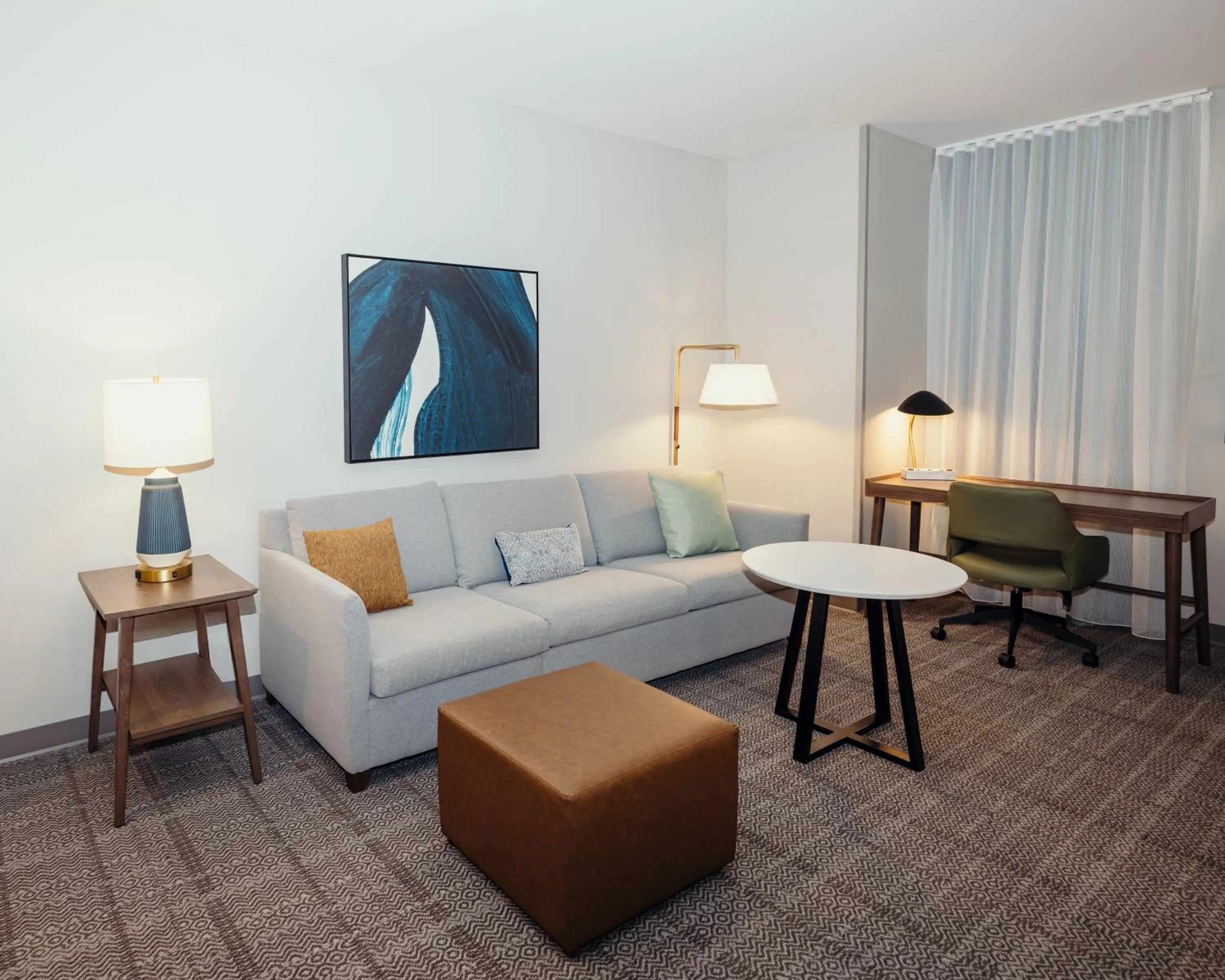 Seating area in STAYBRIDGE SUITES Des Moines North - Ankeny by IHG