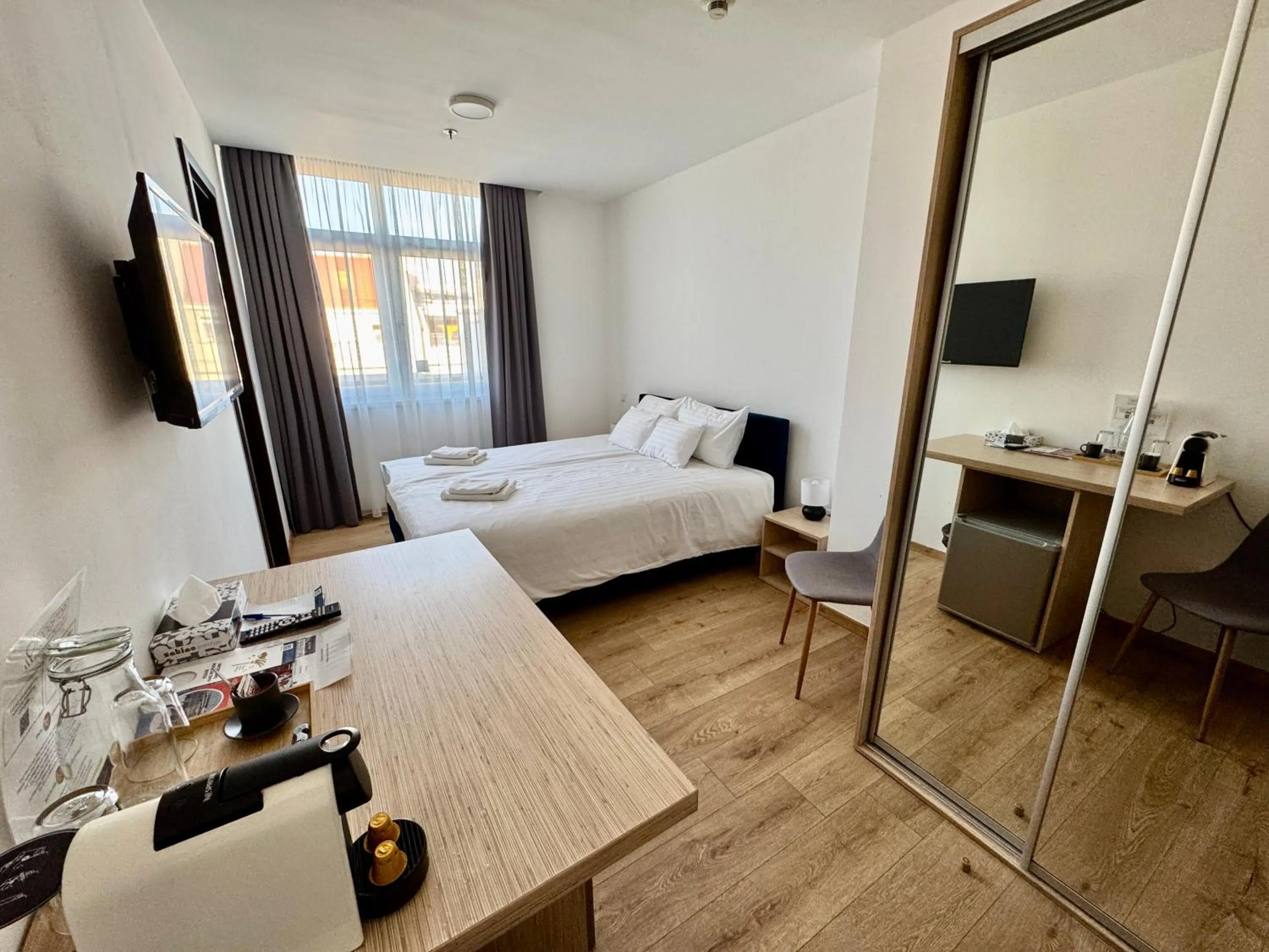 Bed in Rooftop City Residence