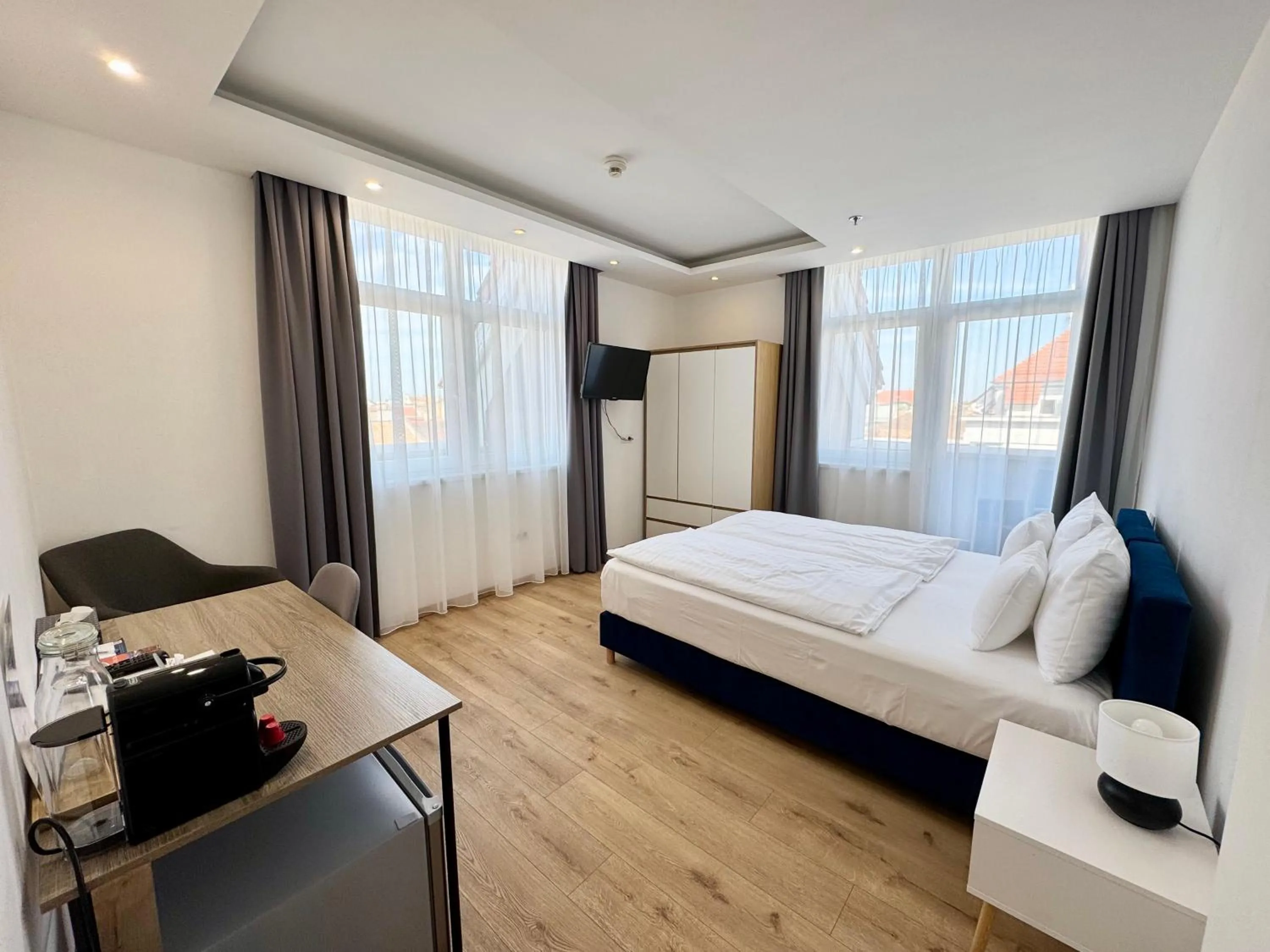 Bed in Rooftop City Residence