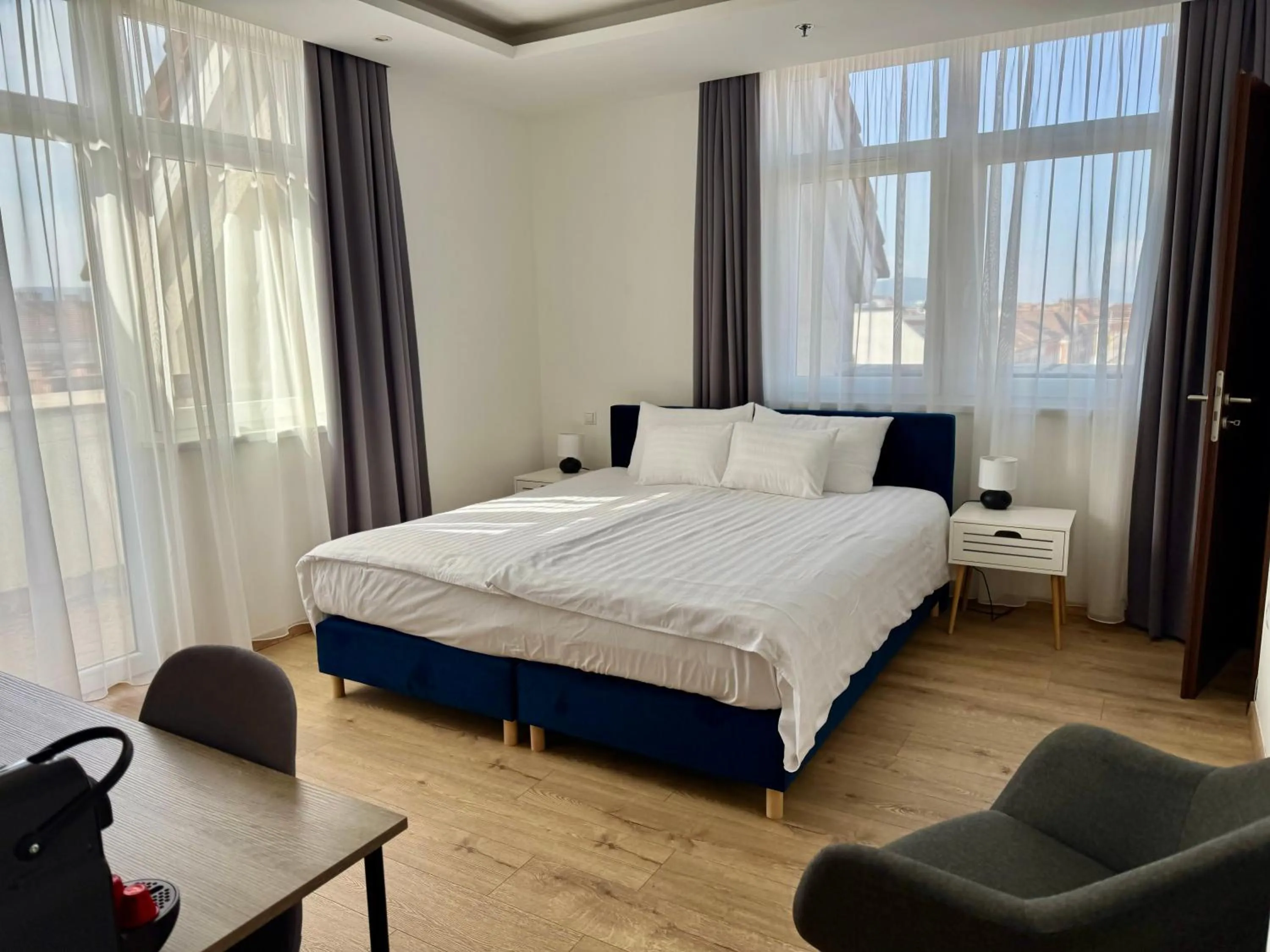 Bed in Rooftop City Residence