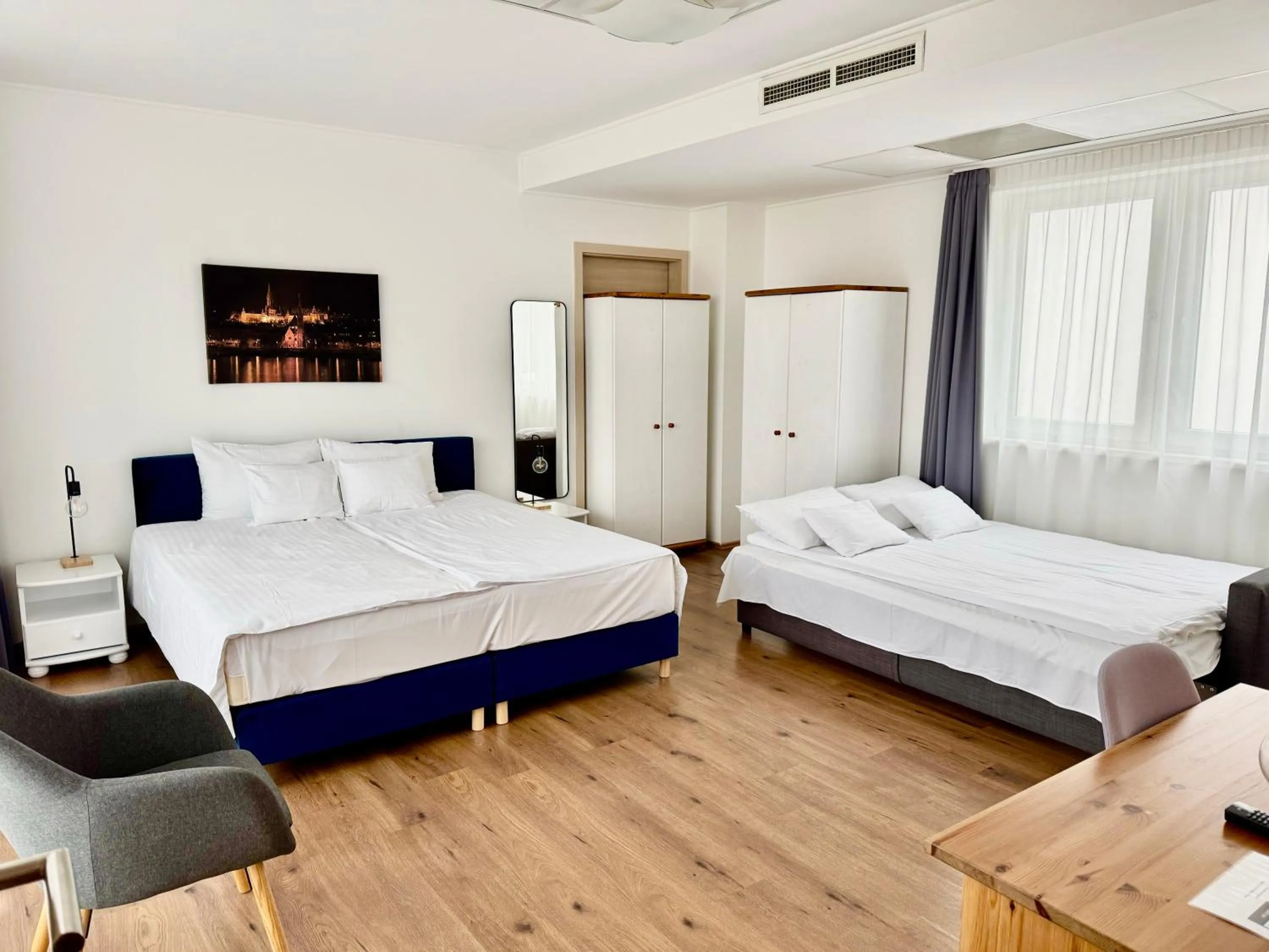 Bed in Rooftop City Residence