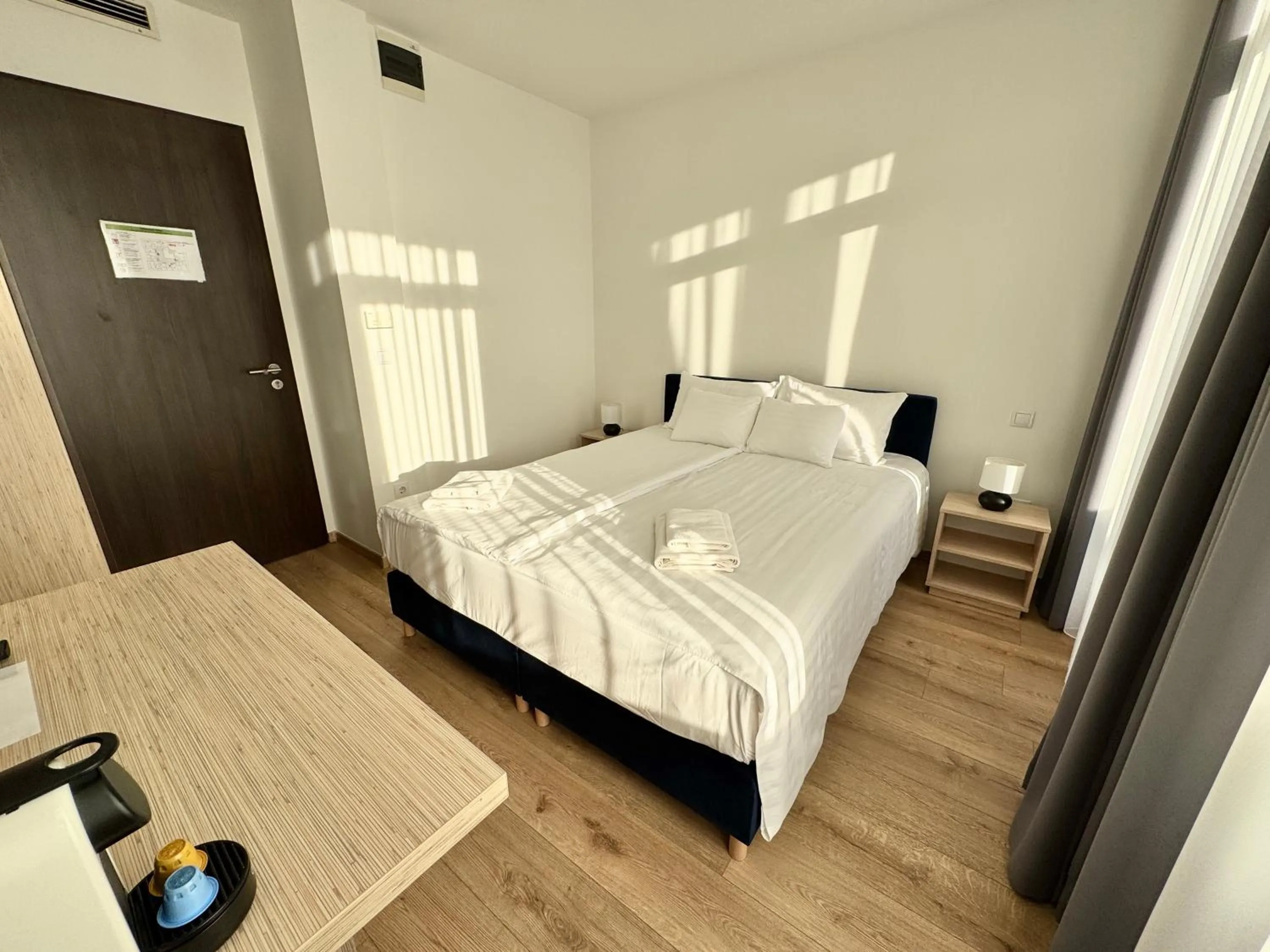 Bed in Rooftop City Residence