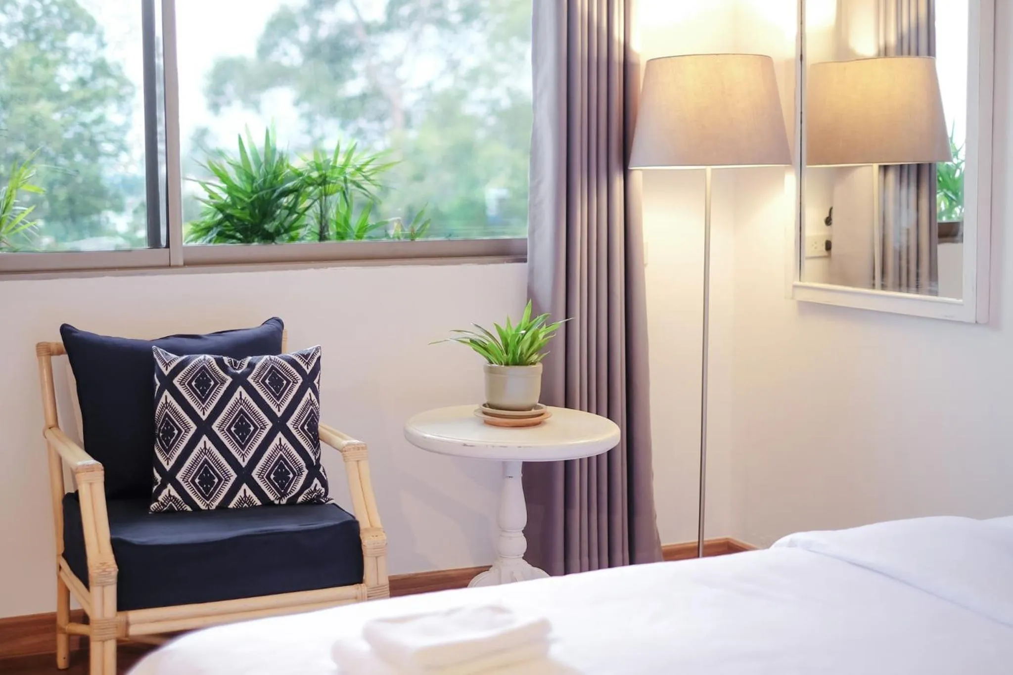 Seating area, Bed in La Mai Hotel