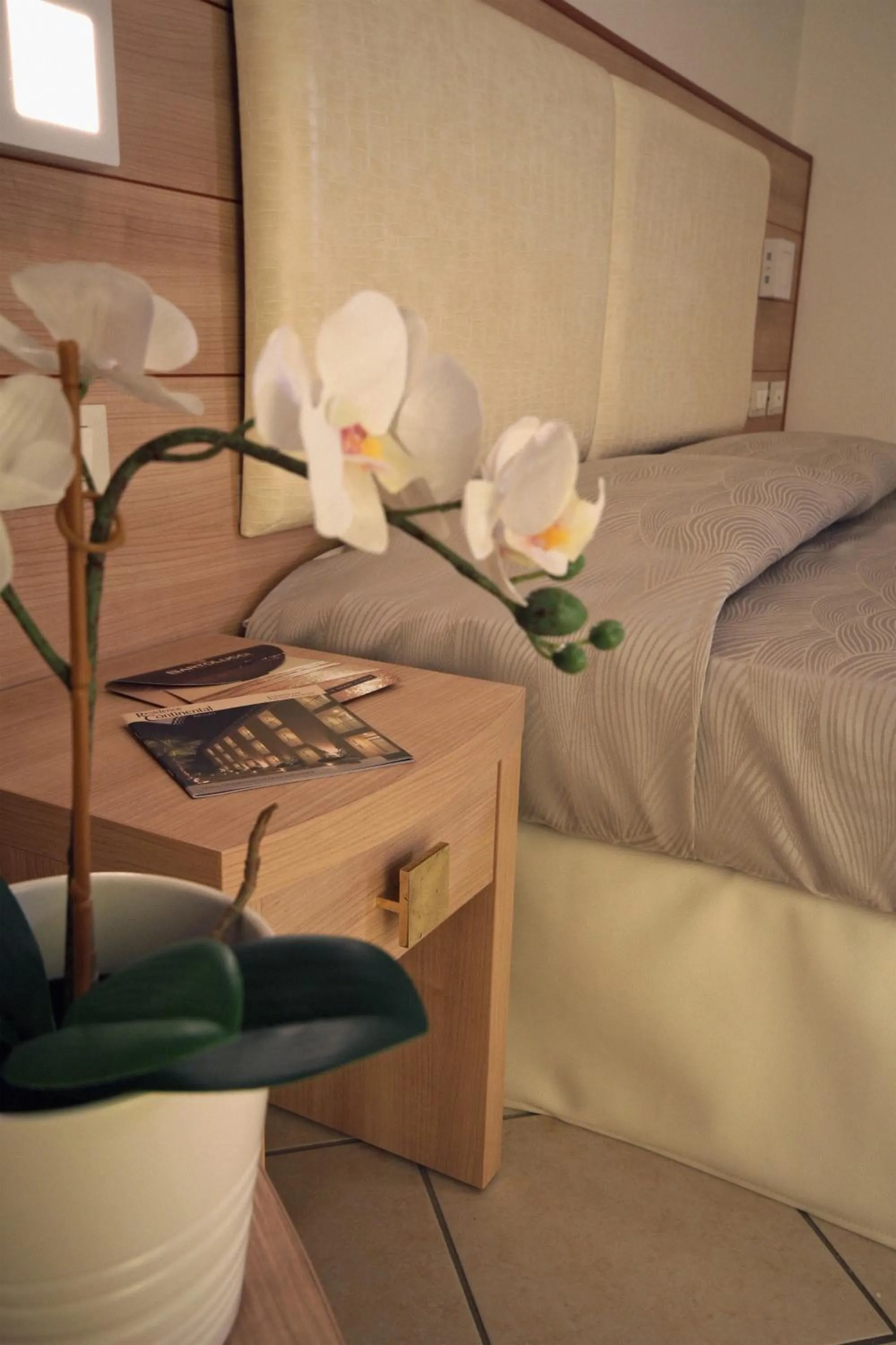 Bed in Hotel Continental & Residence