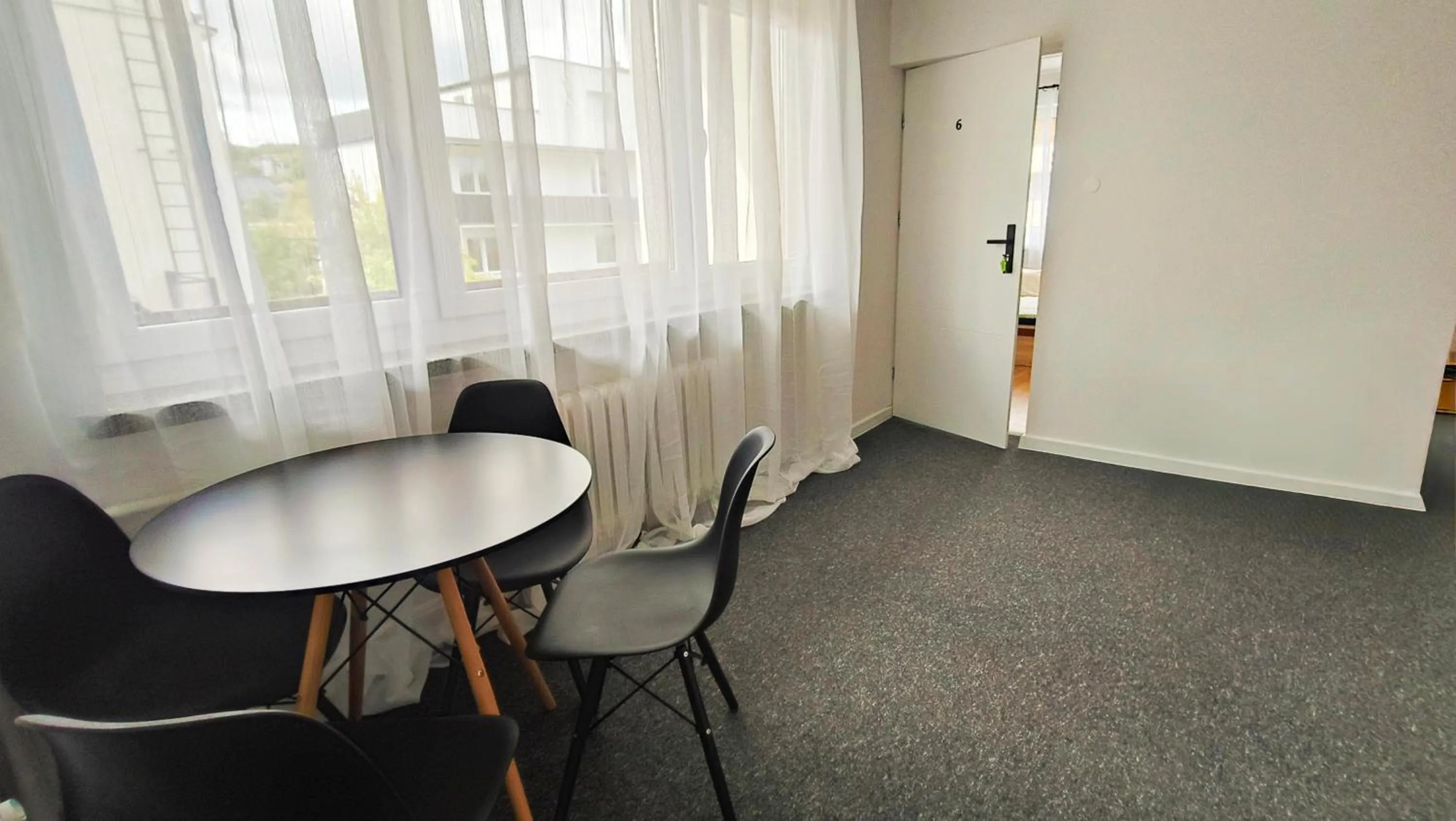 Communal lounge/ TV room in TK Apartamenty I Pokoje