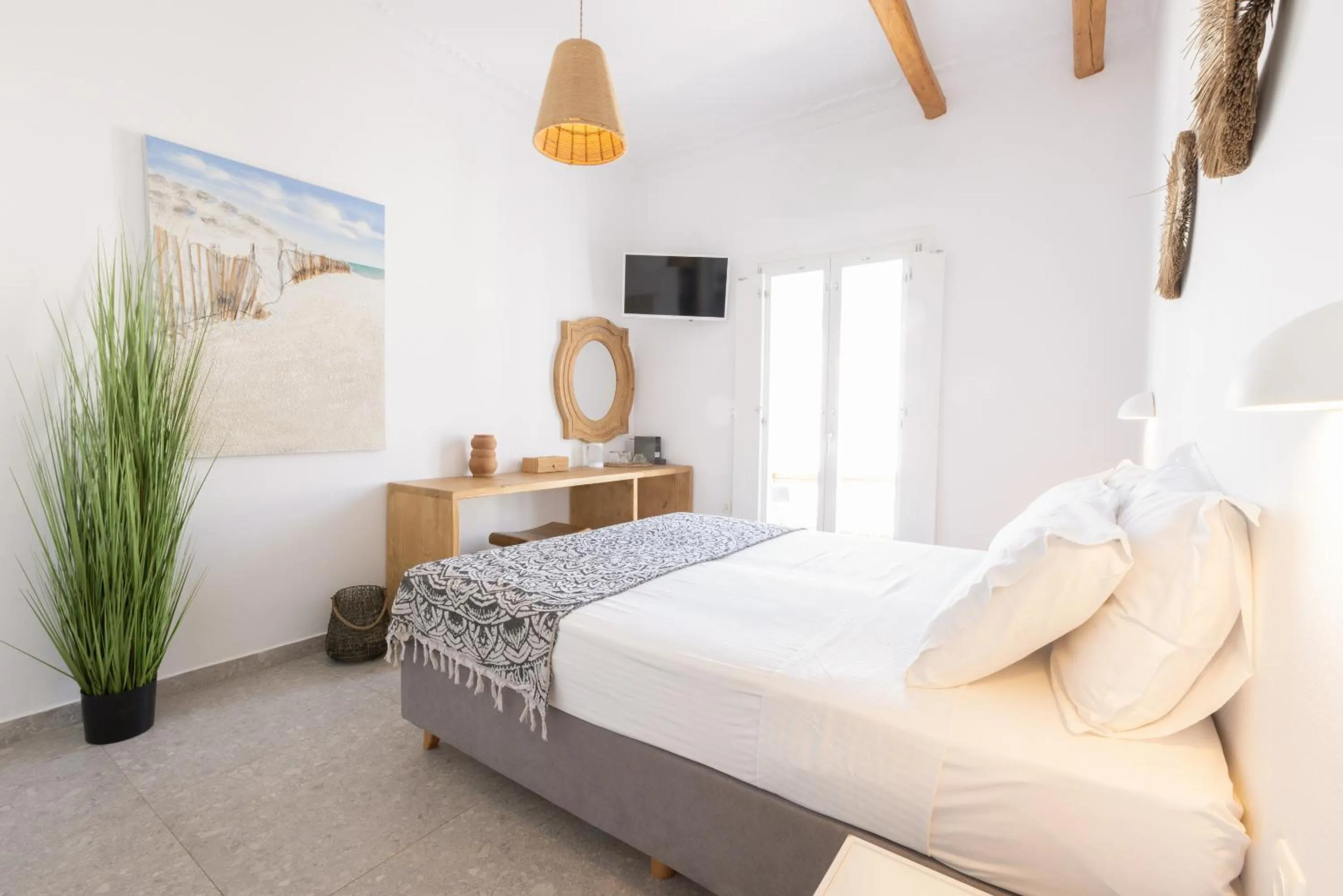 Bed in Parosquare Central Suites