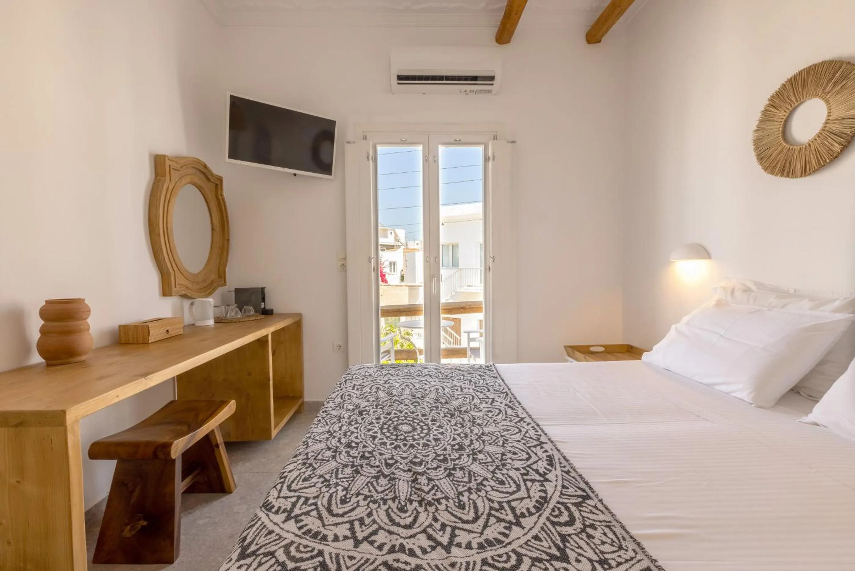 Bed in Parosquare Central Suites