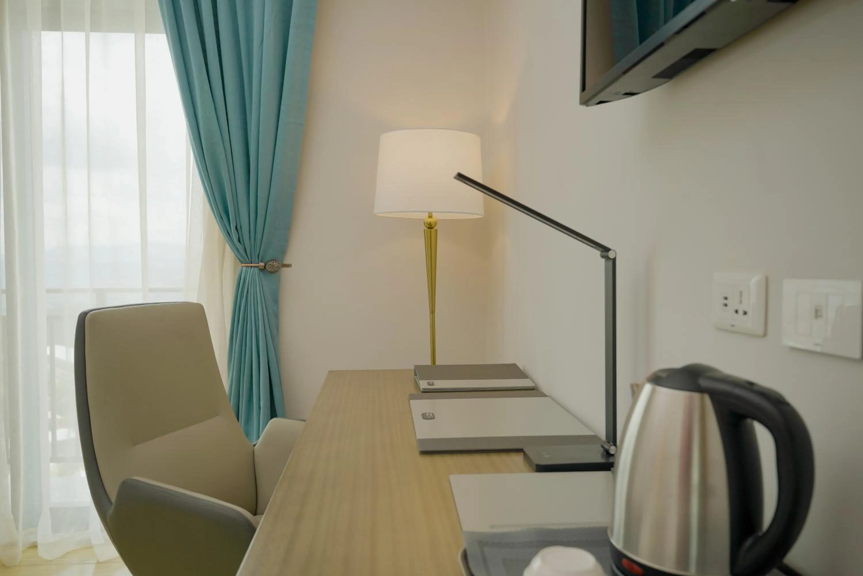 Seating area in Stay Easy Plus Hotel