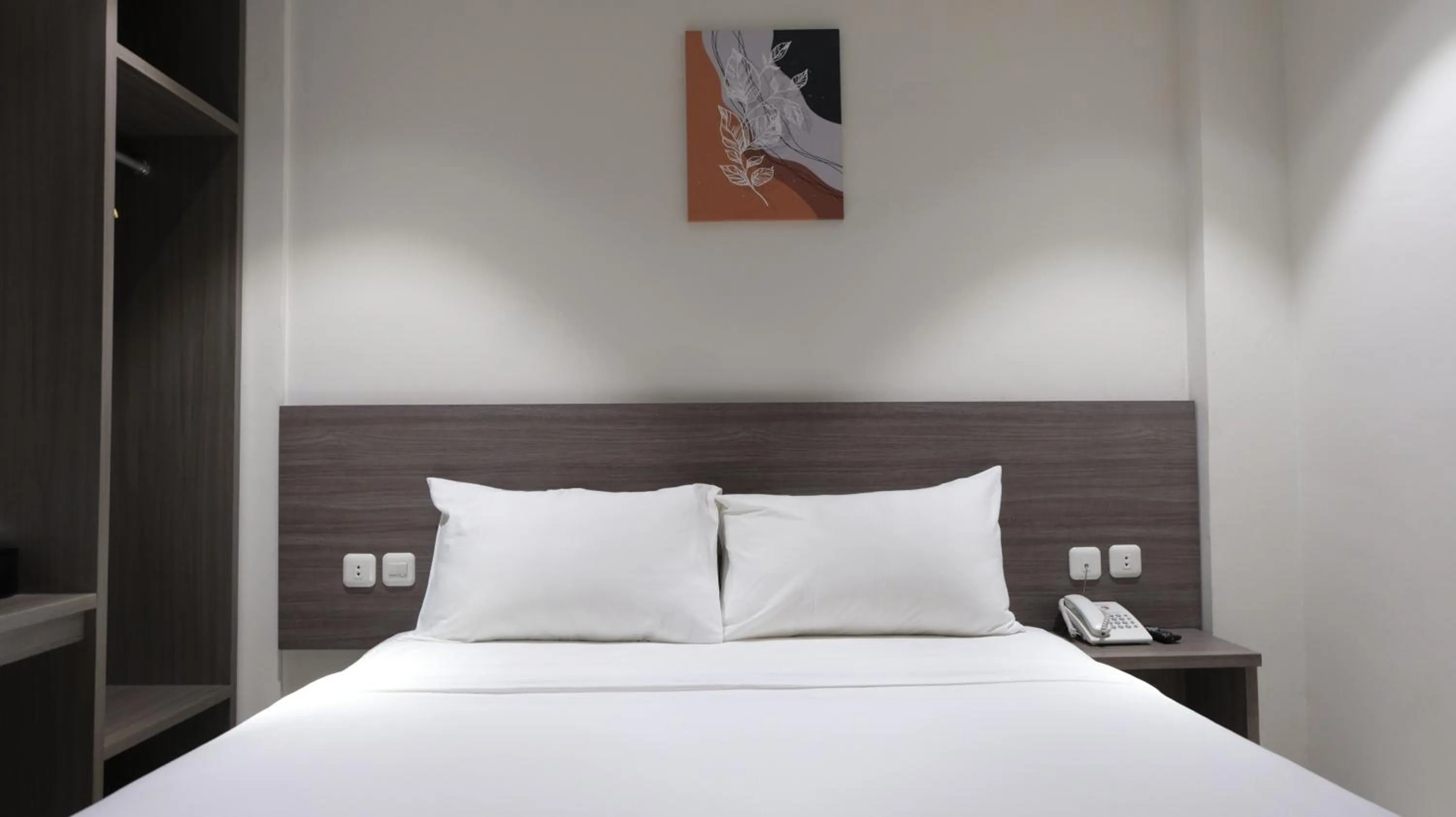 Bed in Lun Hotel Manado