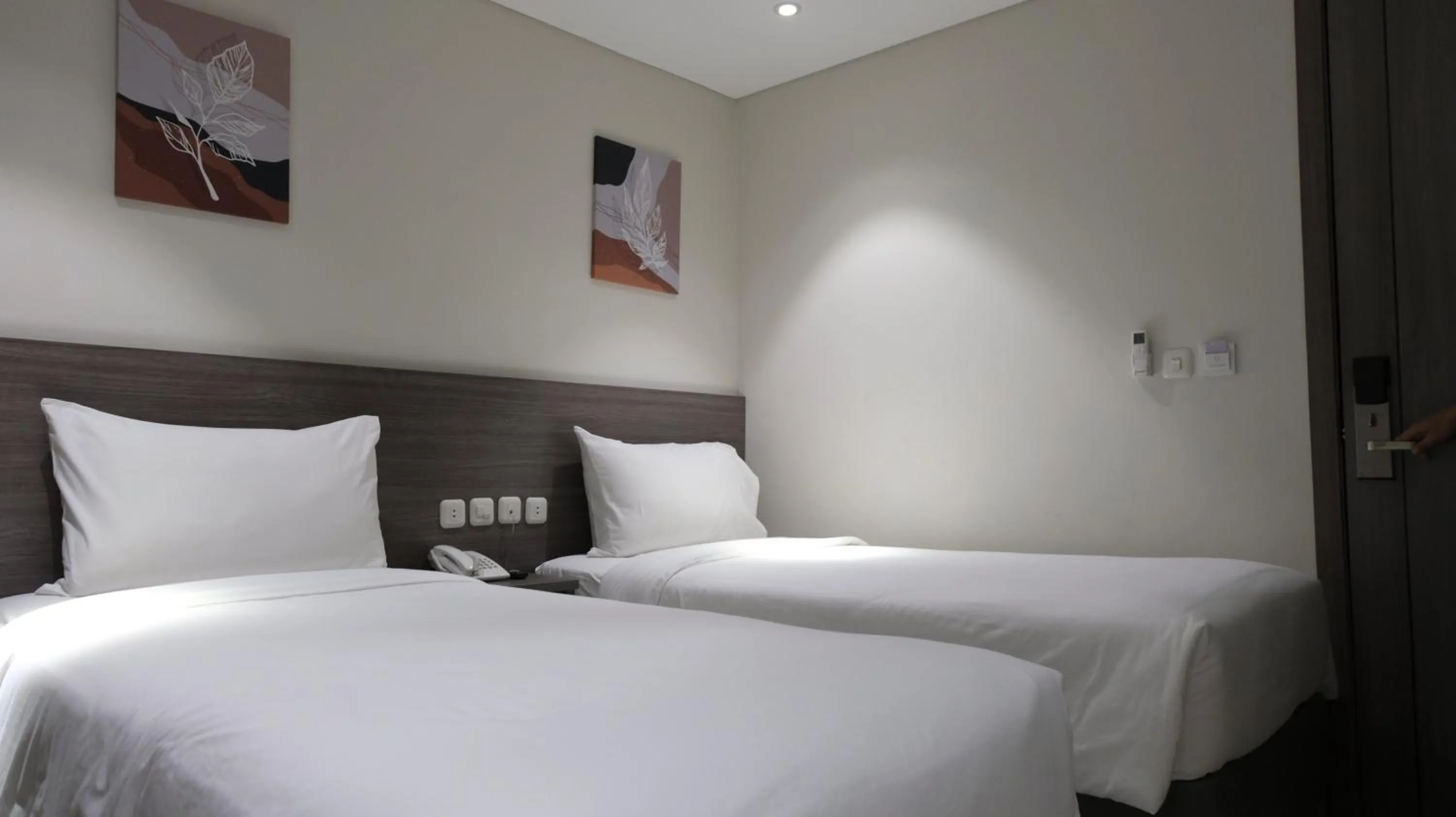 Bed in Lun Hotel Manado