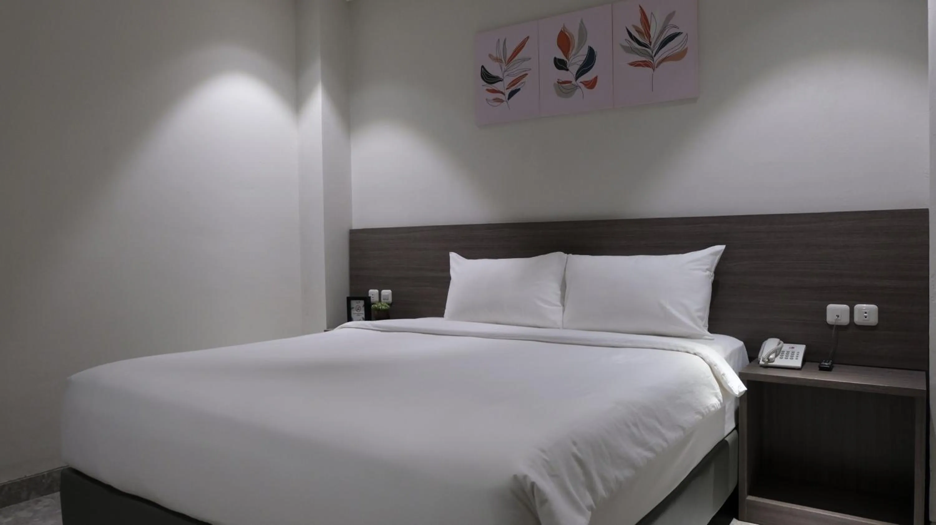 Bed in Lun Hotel Manado
