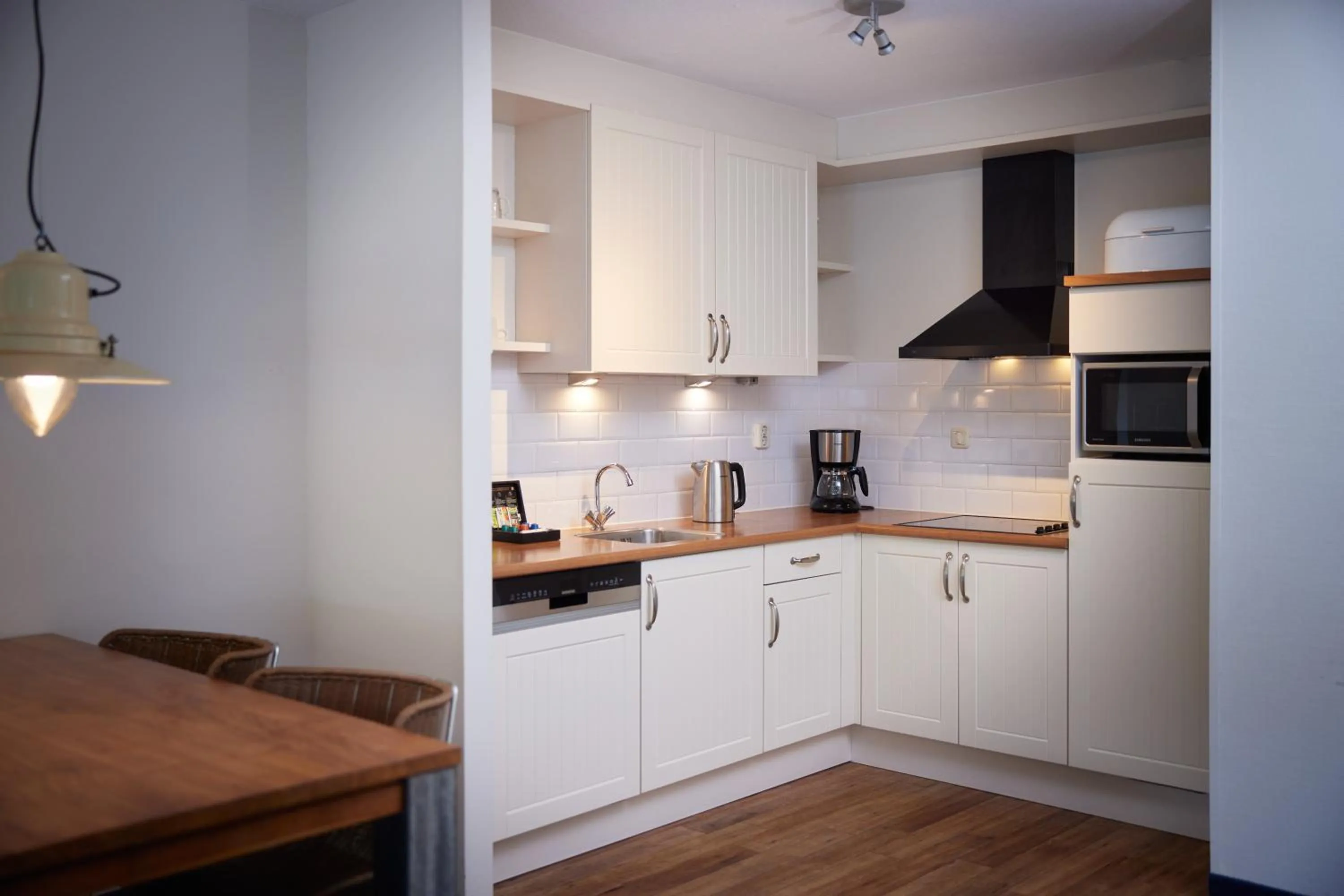 Kitchen or kitchenette in WestCord ApartHotel Boschrijck