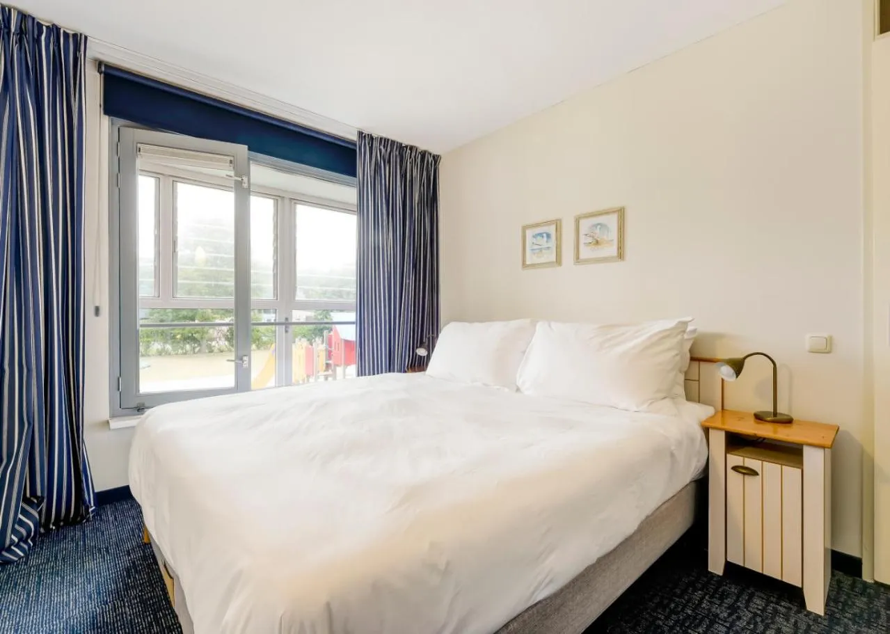 Bedroom, Bed in WestCord ApartHotel Boschrijck