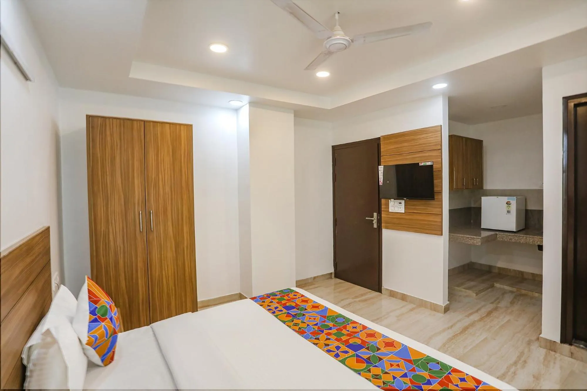 Bed in FabHotel Unique Stay