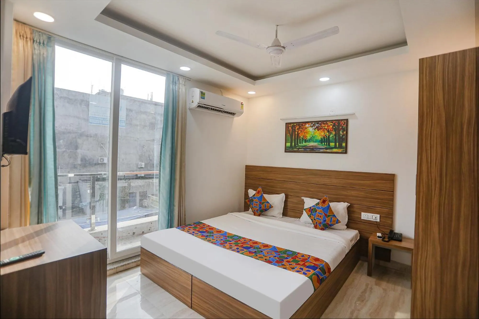 Bed in FabHotel Unique Stay